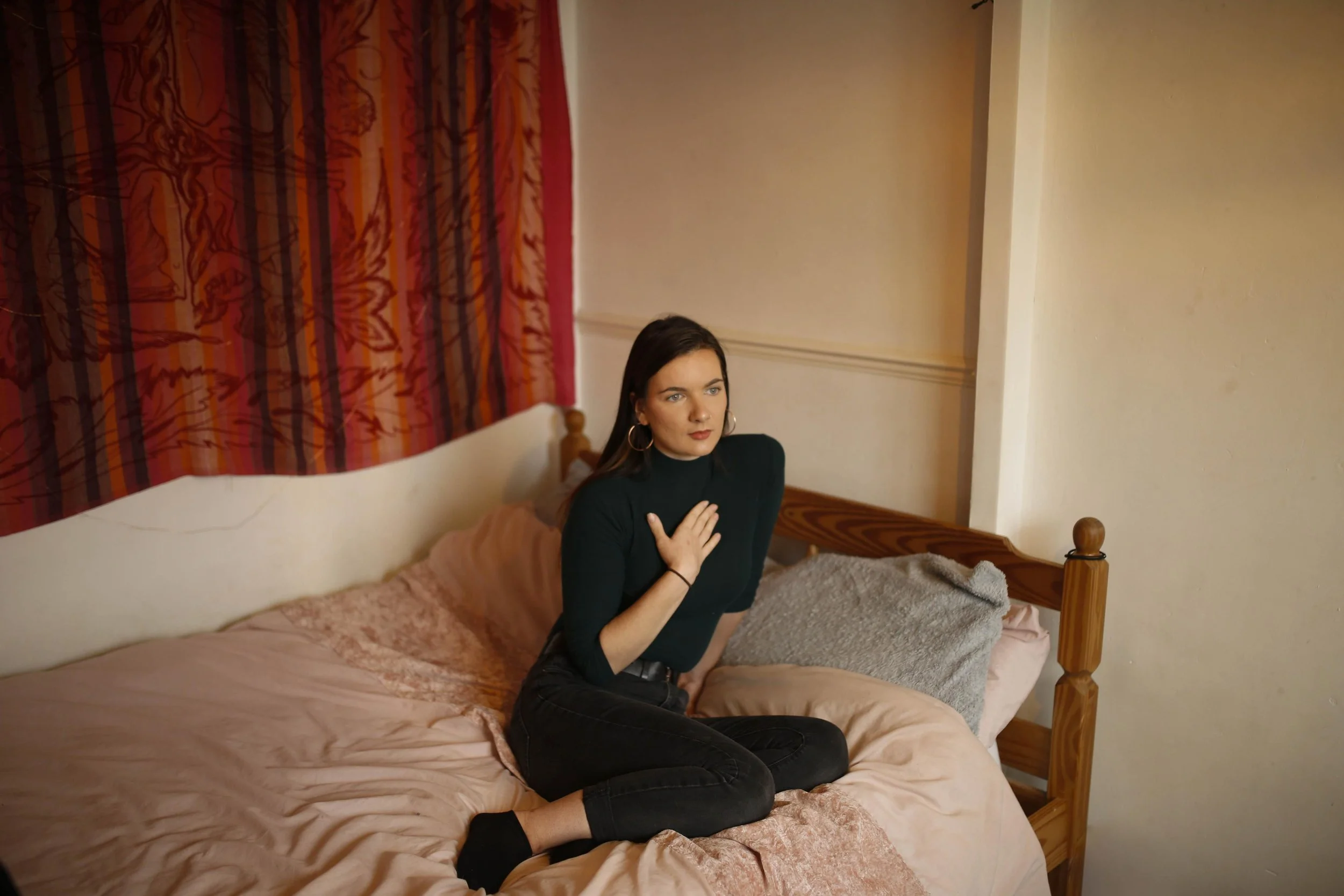 Person practising compassionate self-awareness, illustrating how Internal Family Systems can help relieve chronic nervous system overdrive.