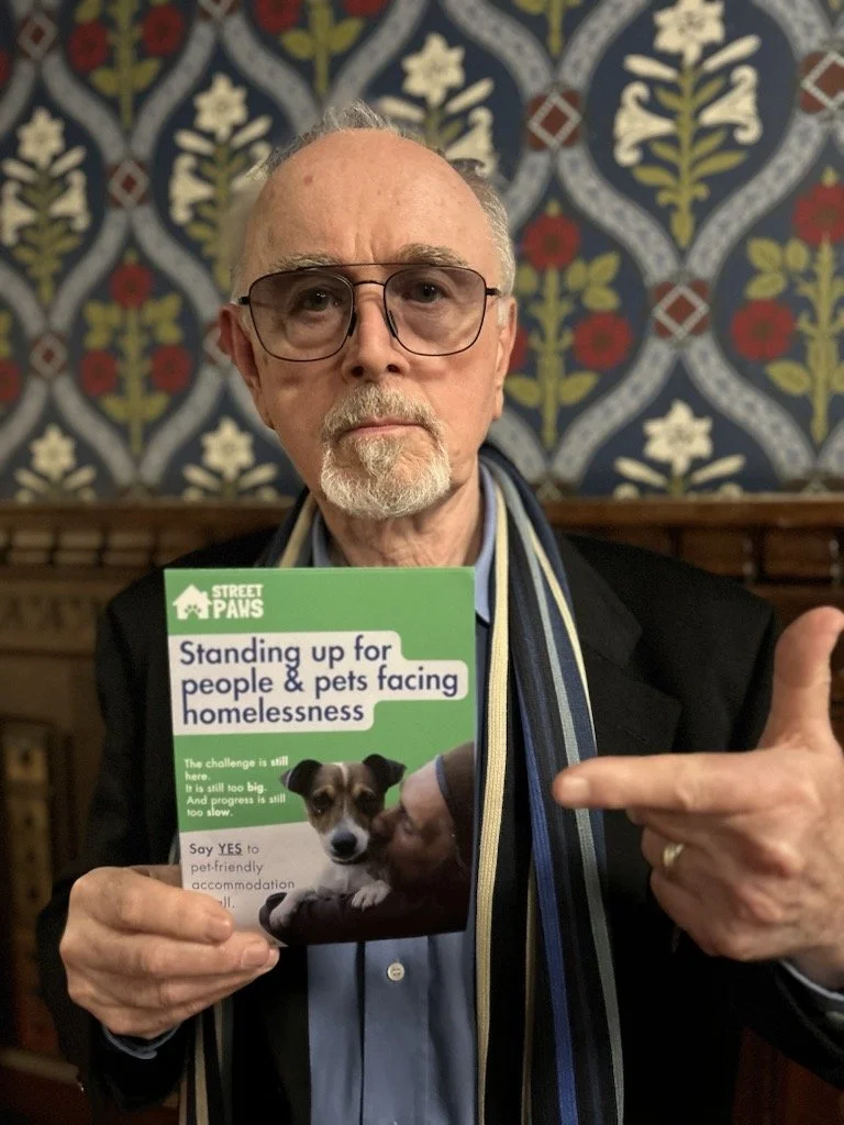 Peter Egan stands with Street Paws!