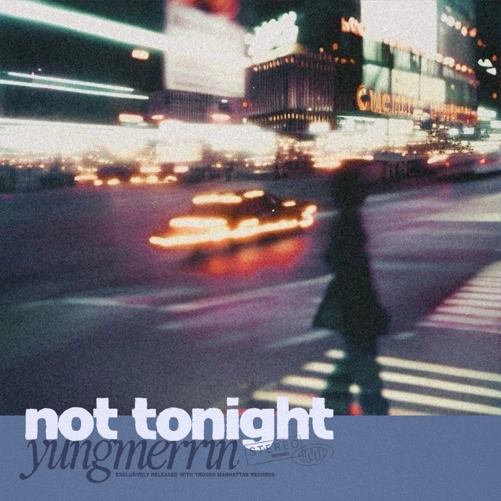 A blurry image of neon-lit cityscape at dusk with the word 'not tonight' in the foreground, possibly part of a sign or text overlay.