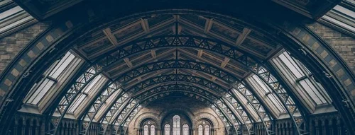Historic building arches representing practical energy advice for complex buildings