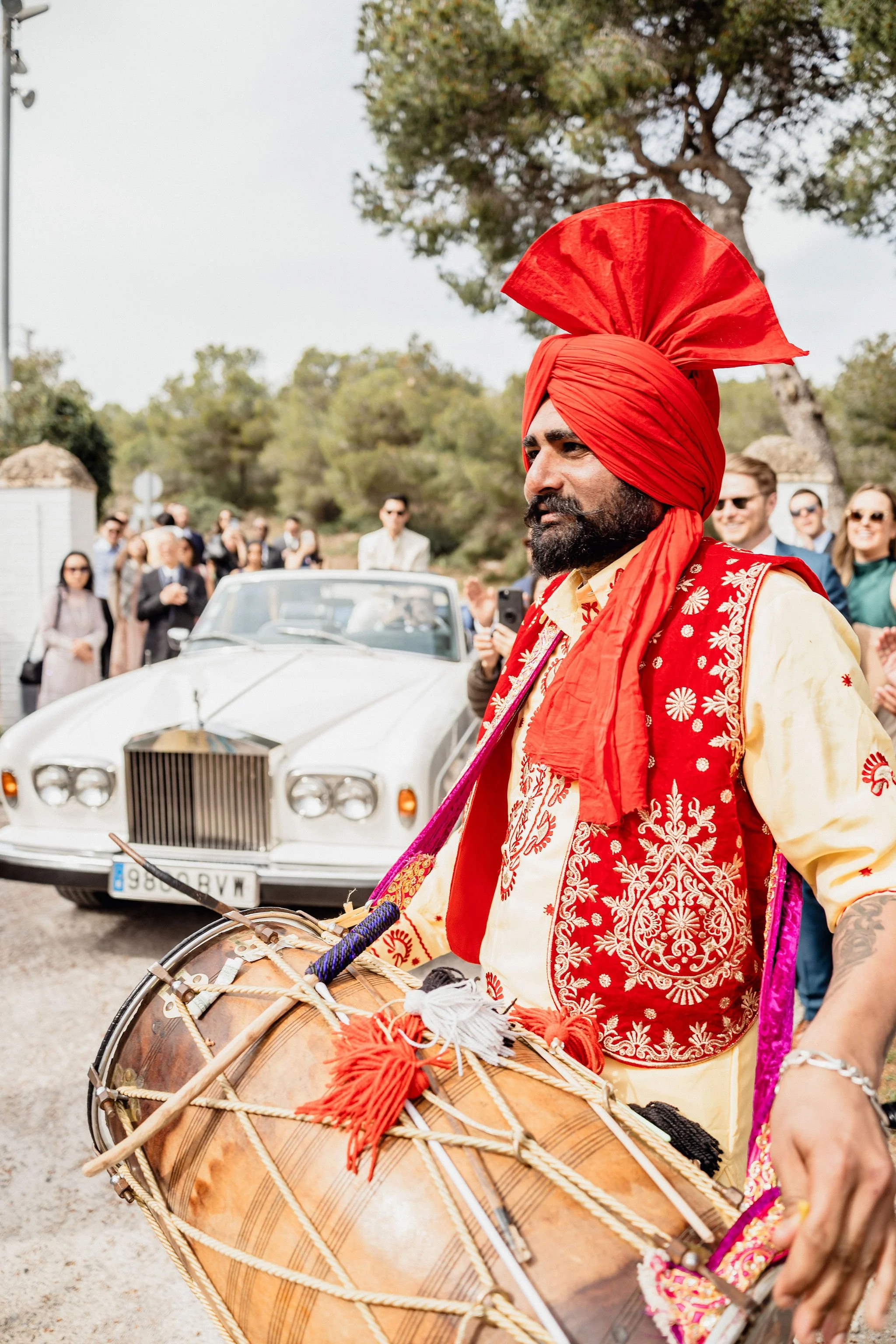 DJs playing music during the lively Baraat procession.