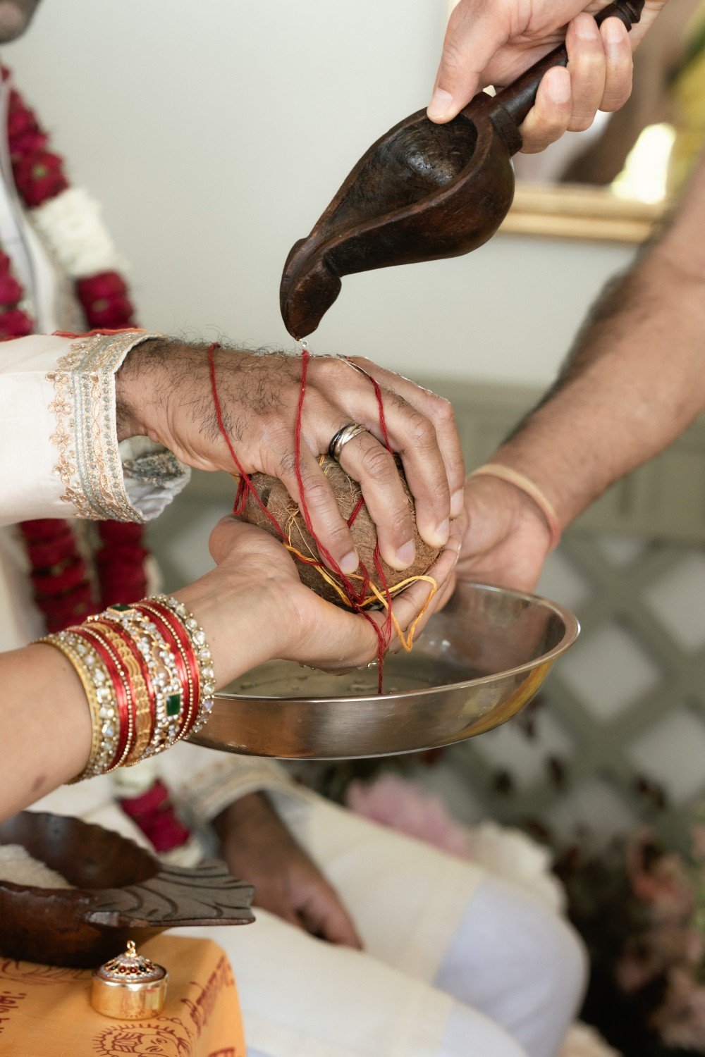 Wedding ritual during a traditional Indian wedding ceremony in Barcelona organized by PearlSandals