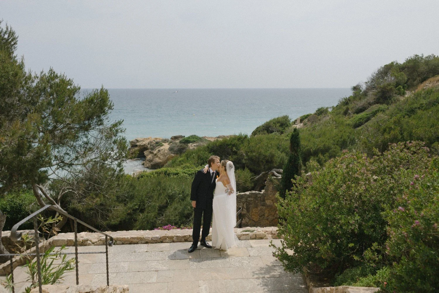 Wedding couple shot with Mediterranean background in june