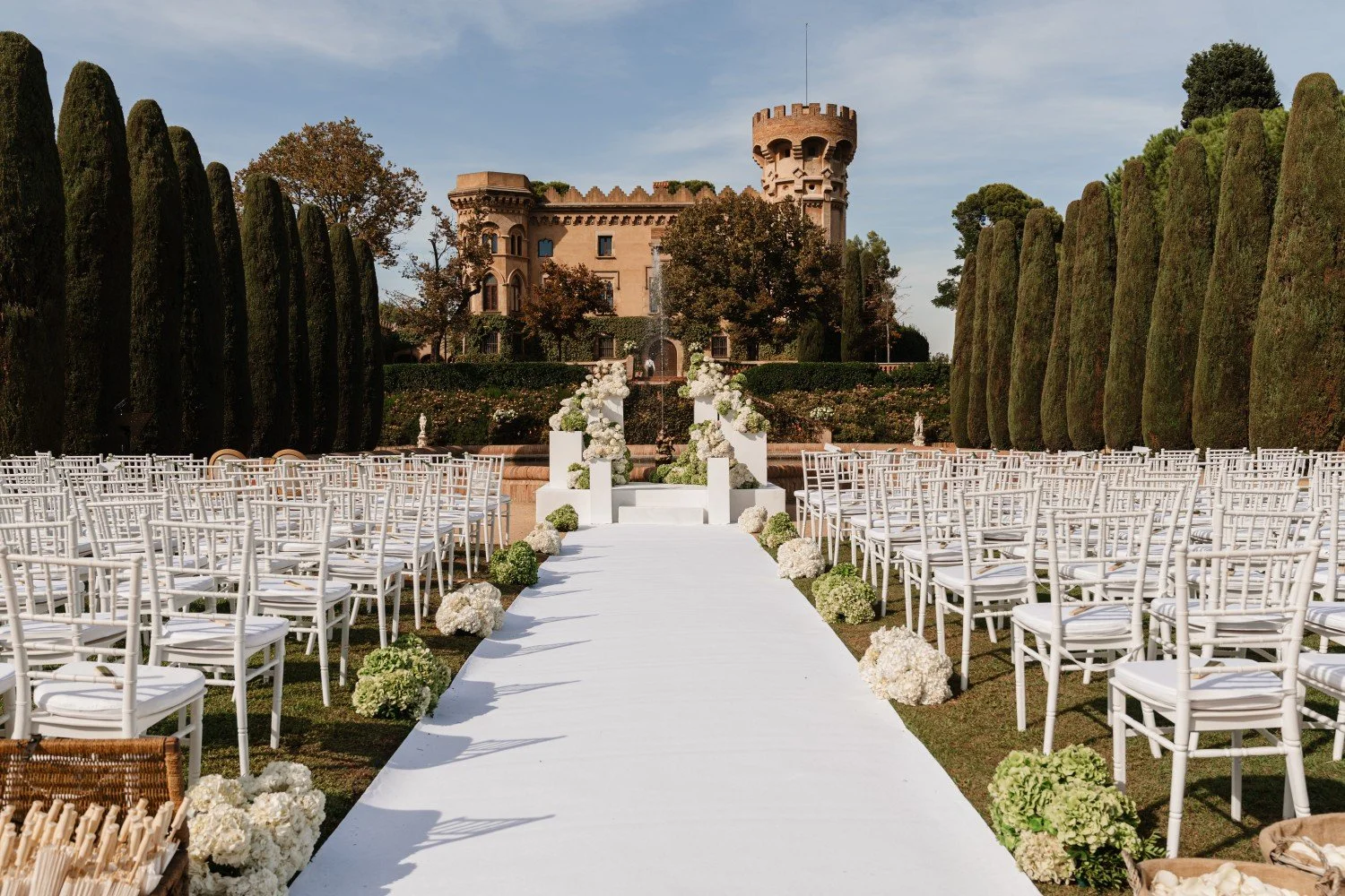 Elegant wedding ceremony setup at Castell de Sant Marçal in Catalonia.