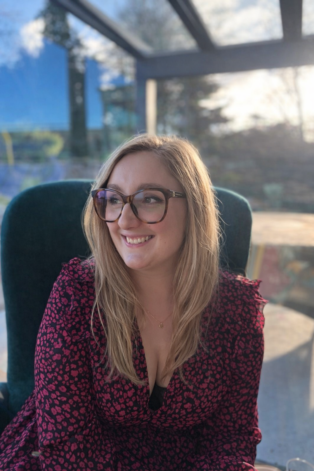 Wedding expert Zoe Burke, smiling and looking away from the camera