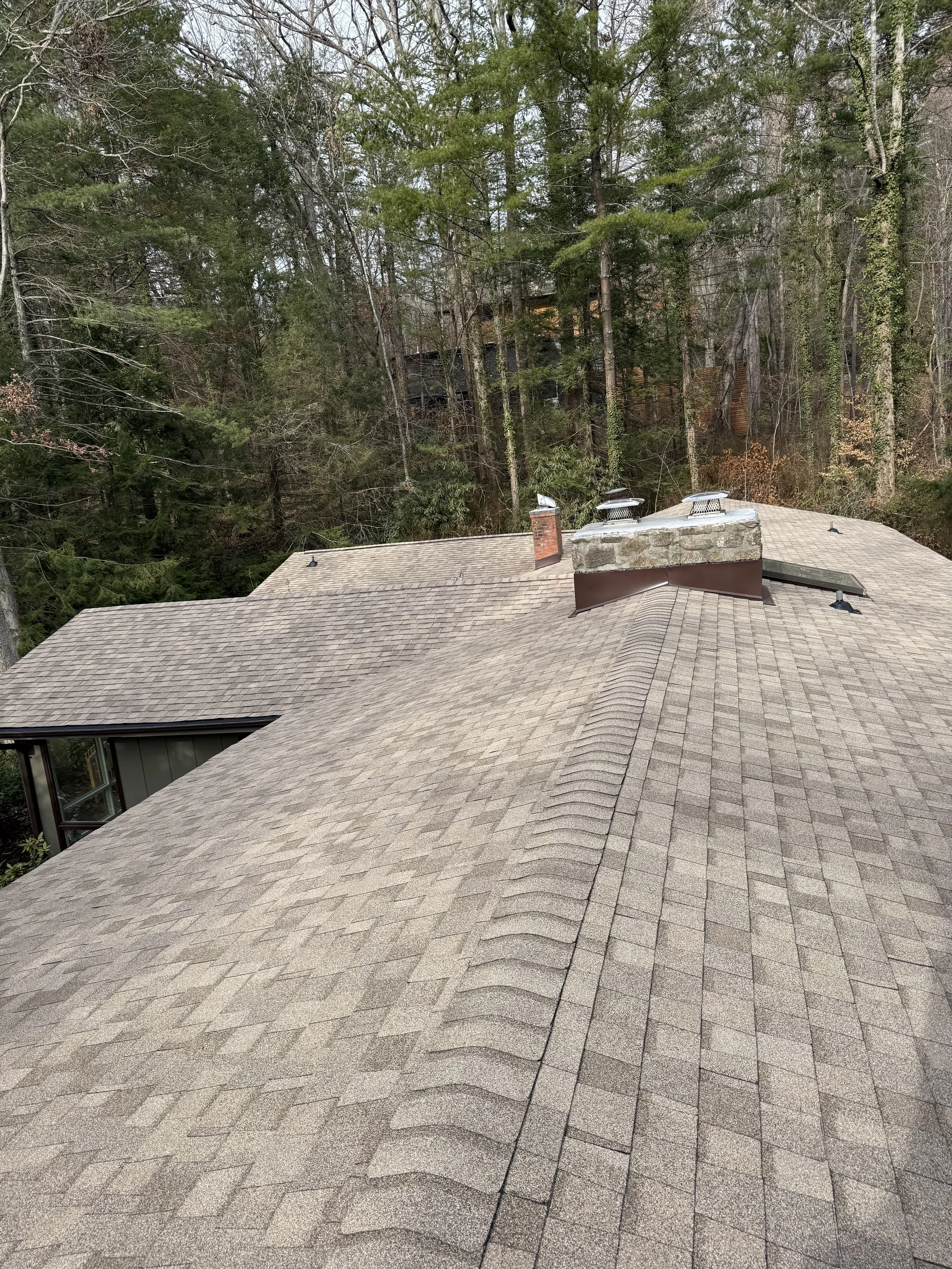Roof replacement in Asheville NC after storm damage