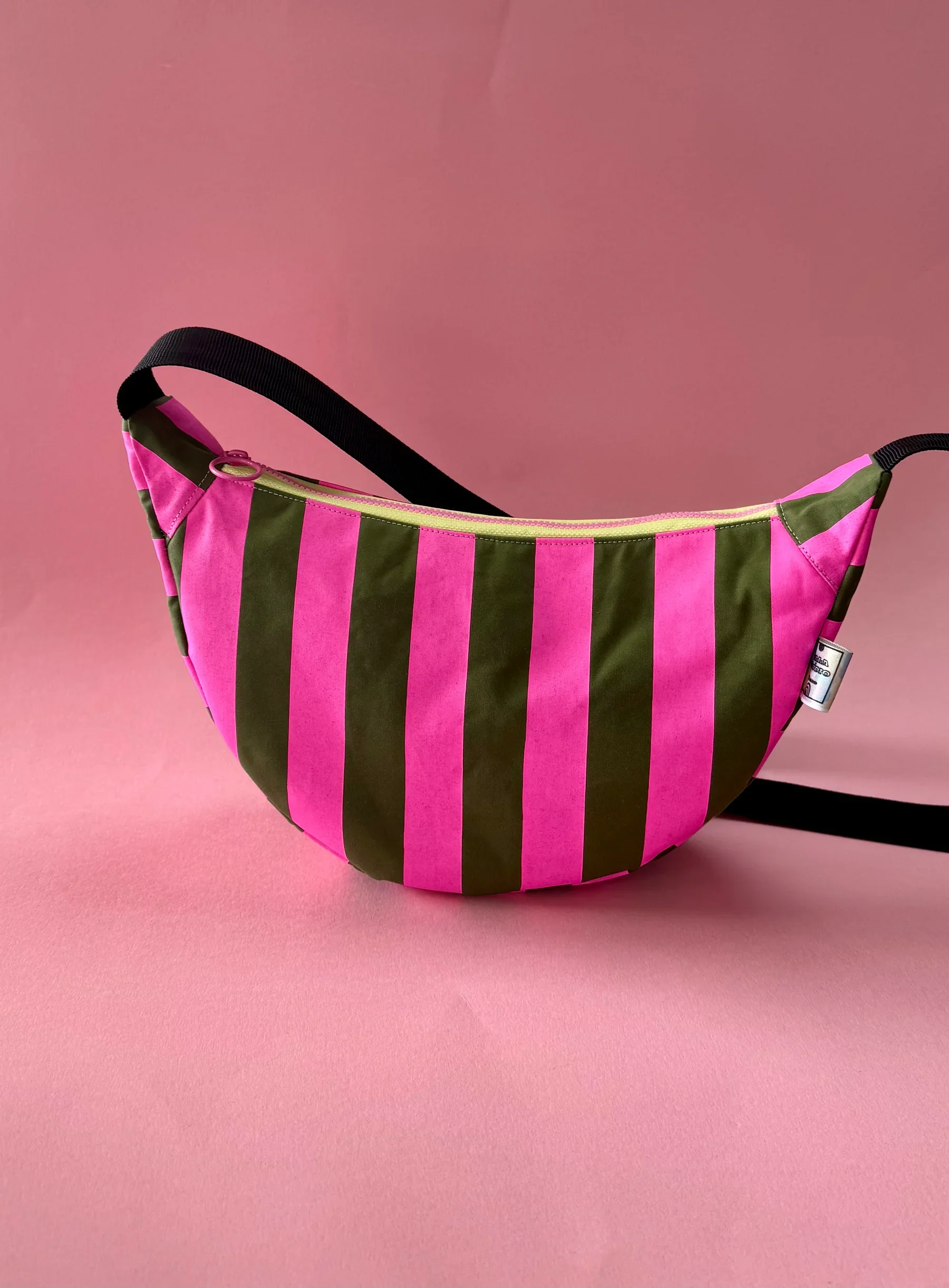 Gweni-Gwyllt-Pink-and-Green-Stripe-Crossbody-Bag.webp