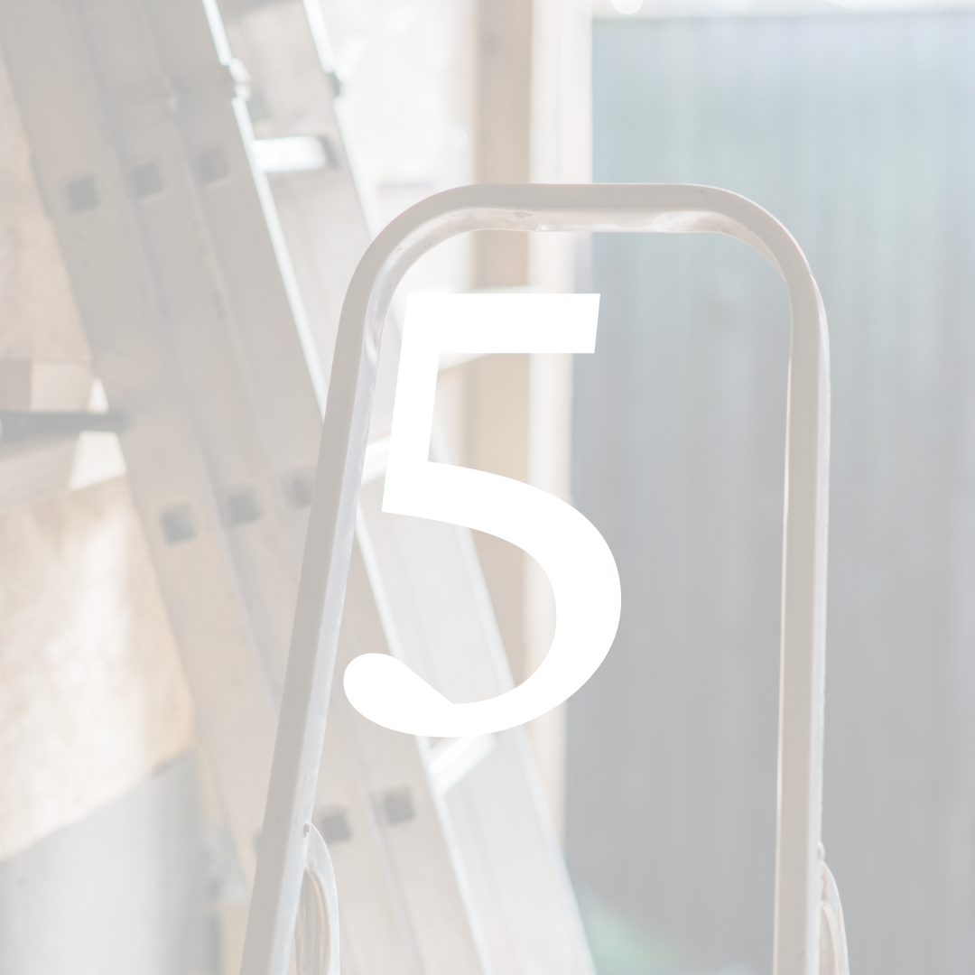 A number 5 overlaid on a blurred image of a step ladder and an extension ladder in a workshop or garage setting.