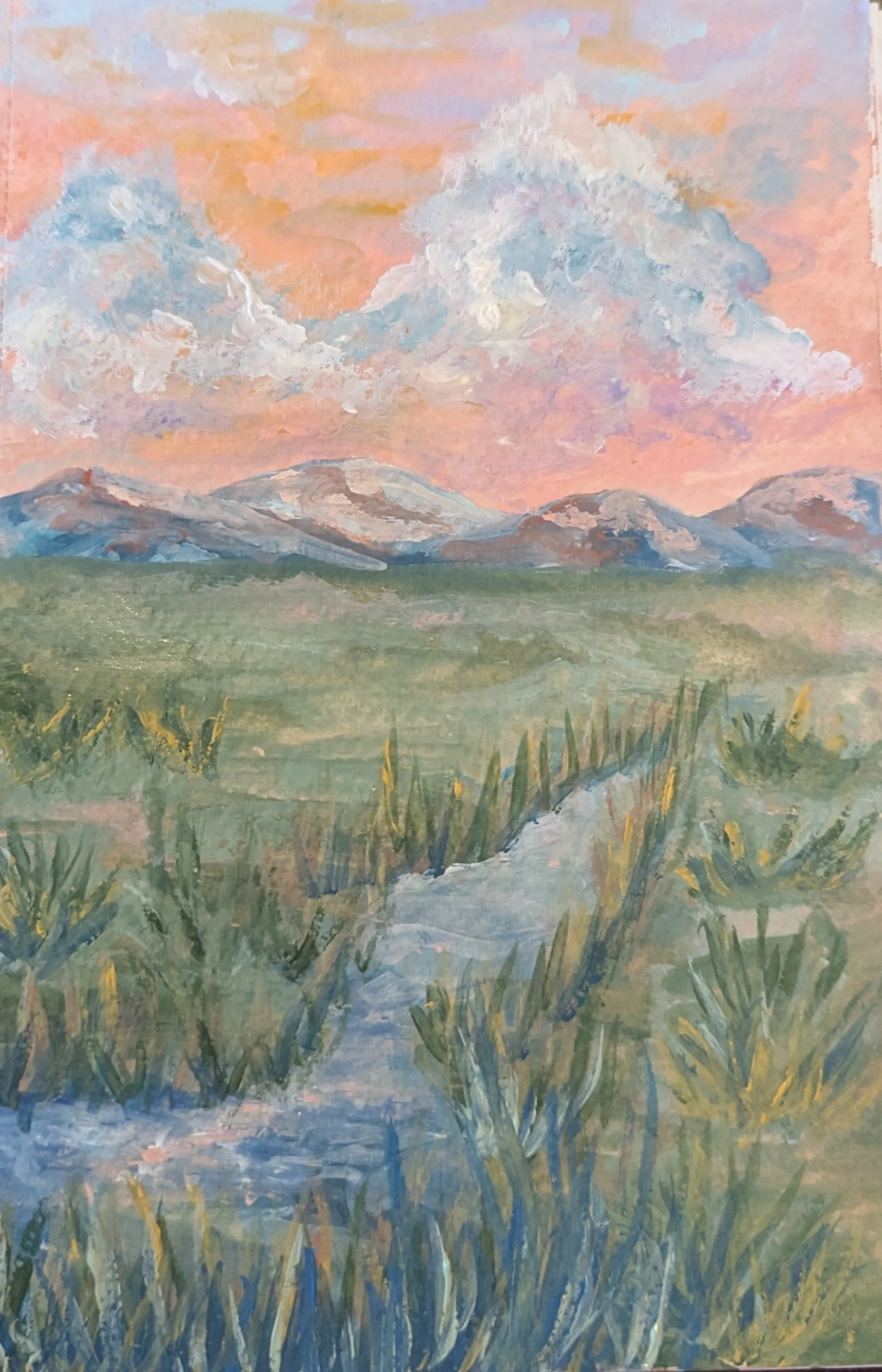 A gouache painting of a landscape showing a stream flowing through tall green grass and plants, with mountains in the background under a sky with pink and blue clouds.