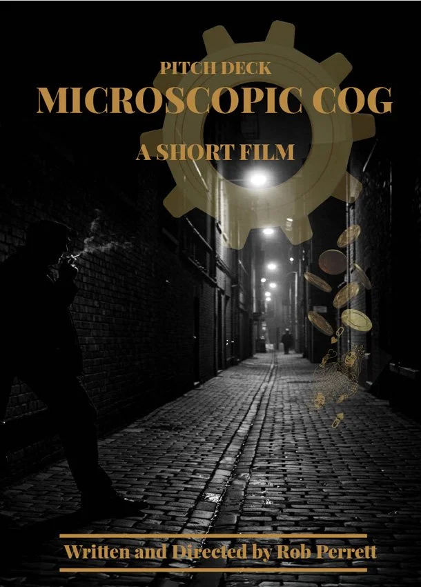 Dark alleyway at night with cobblestone street and streetlights. A silhouette of a man with a camera stands on the left. Text overlay reads 'Pitch Deck Microscopic Cog, A Short Film, Written and Directed by Rob Perrett' with a gear graphic and floating coins or cogs.