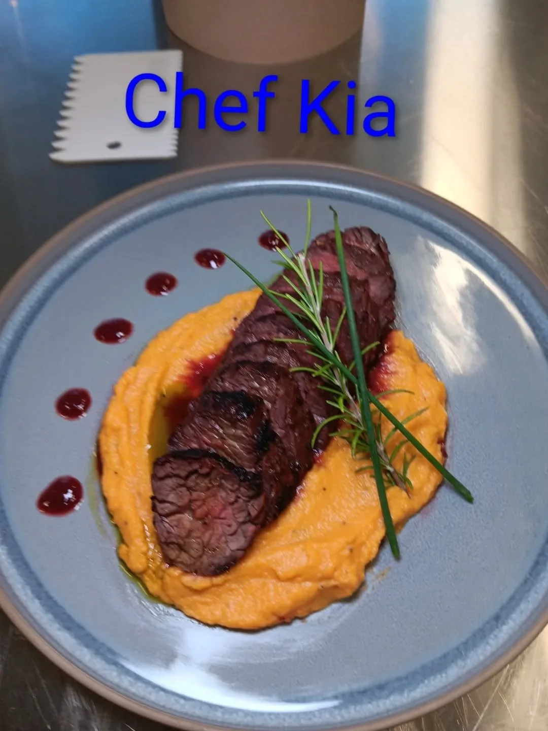 Our finished lab assignment for today........I grilled my Hanger Steak....

Mine is medium well....

My Bourbon and Butter Rub grilled Hanger Steak w/ Jalepeno Sweet Potato Puree a fresh herb oil, and a Blackberry BBQ Sauce

I think I did pretty good
