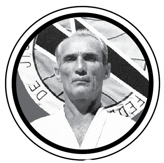 Black and white photo of a man in a martial arts uniform in front of a circular background with text.