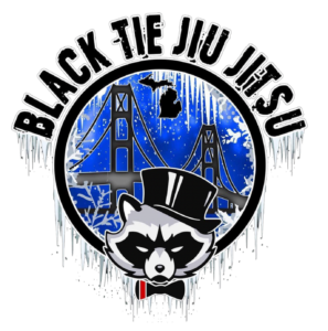 A circular logo featuring the Golden Gate Bridge, a raccoon wearing a top hat, and the text 'Black Tie Jiu Jitsu' at the top.