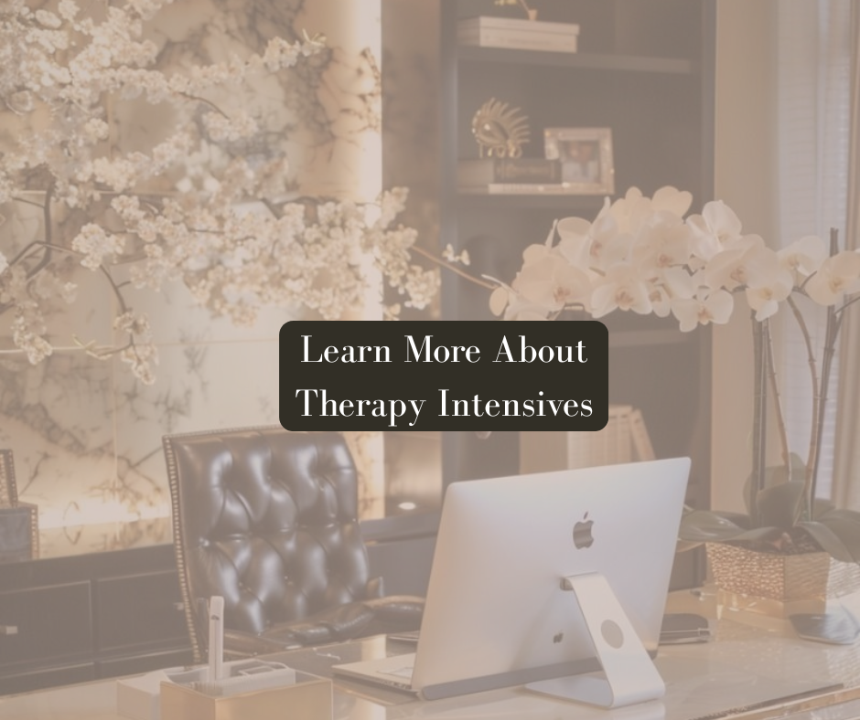 Elegant therapy office with a floral arrangement and modern decor, featuring the text “Learn More About Therapy Intensives.”