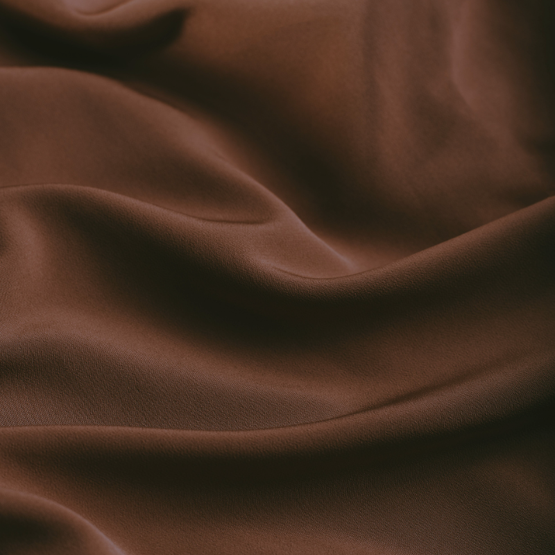 Matte satin background reflecting luxury, transformation, and emotional depth