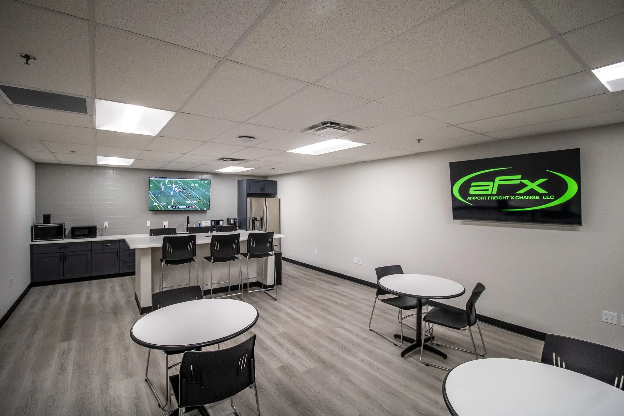 First-floor renovation featuring new offices, reception area, and open office space.