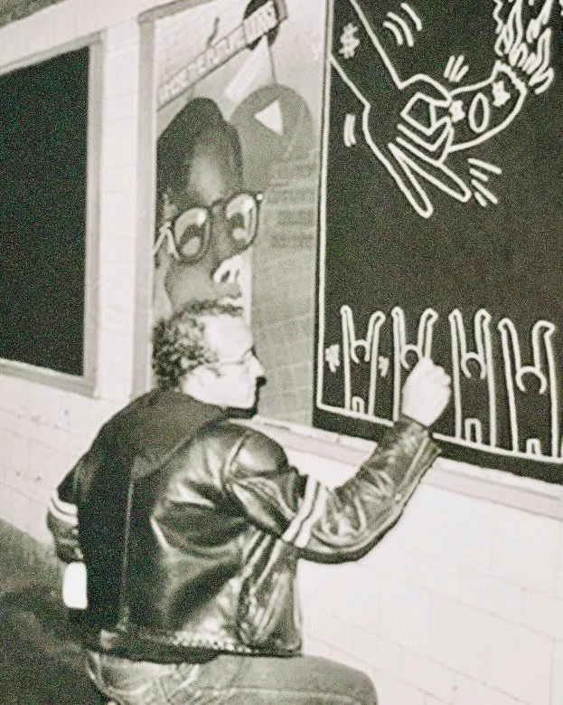 Keith Haring was part of the downtown art scene that defined New York in the 1980s, and much of that energy lived around Nolita.

Long before his work appeared in museums around the world, Haring was drawing chalk murals in subway stations and on wal