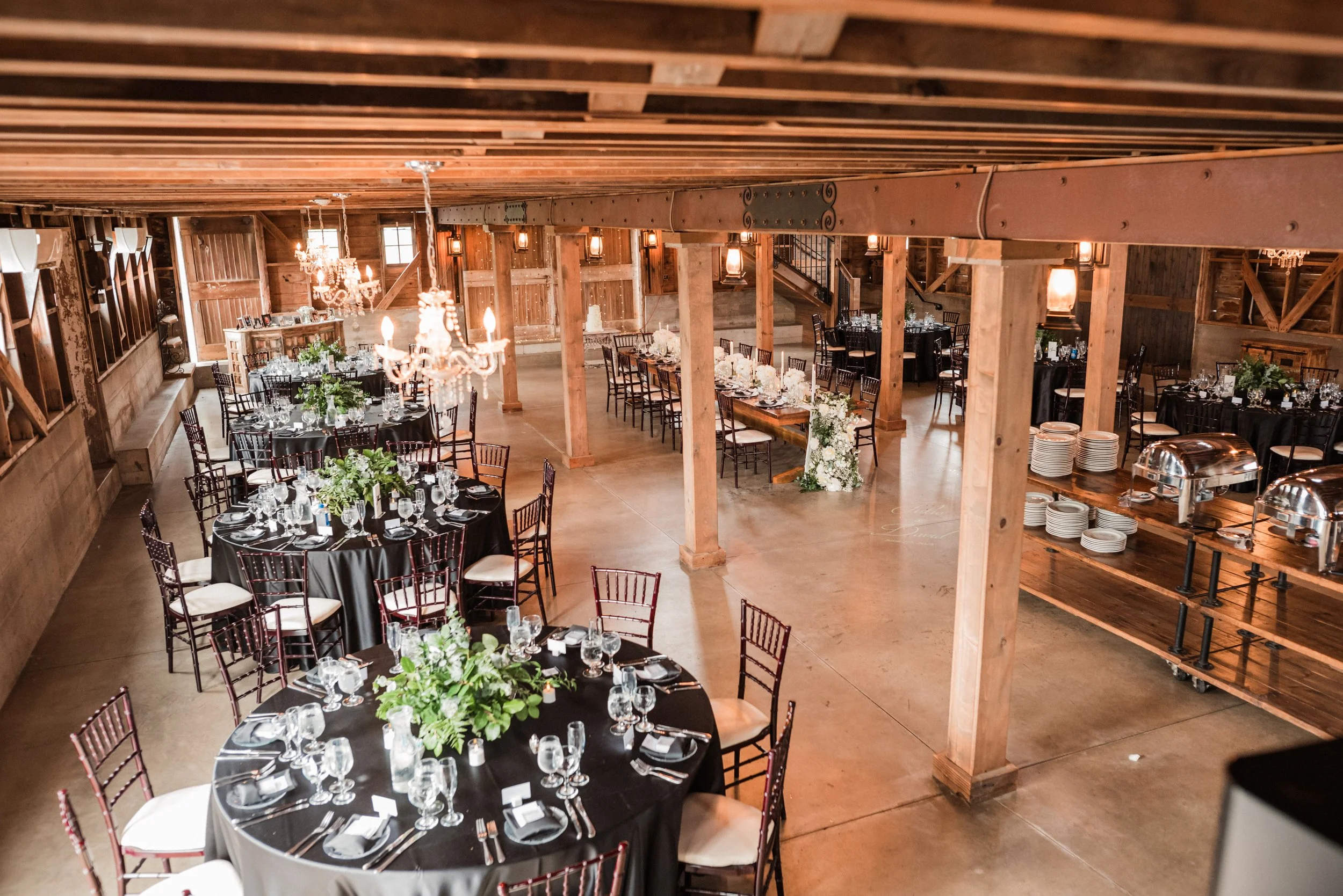 barn wedding venue with black linens