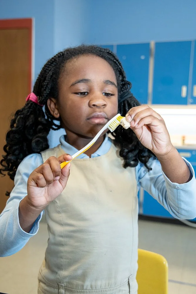 girl and toothbrush.jpg