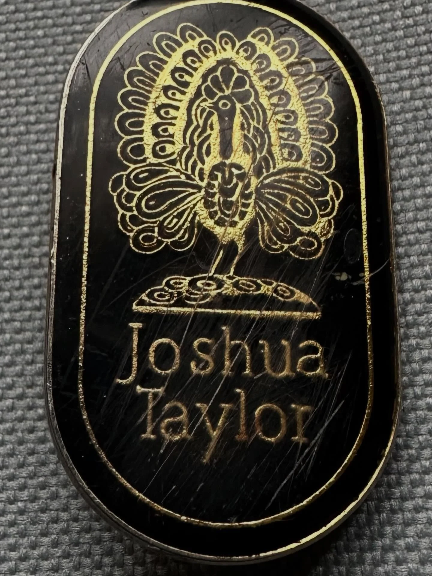 Joshua Taylor Shop Badge, Market Street Cambridge c.1990. Black with gold detail. I did a couple of days work experience there in about 1990/91, I&rsquo;m not sure if this is where I got the badge. 
(Michelle Bullivant Archives) #joshuataylor #cambri