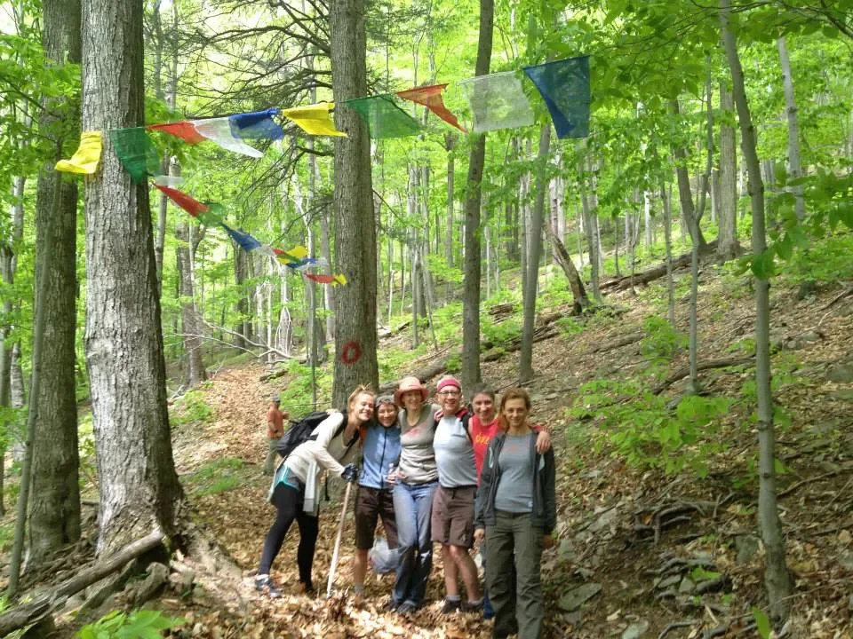 Staff-Hiking-Trail-with-Prayer-Flags.webp