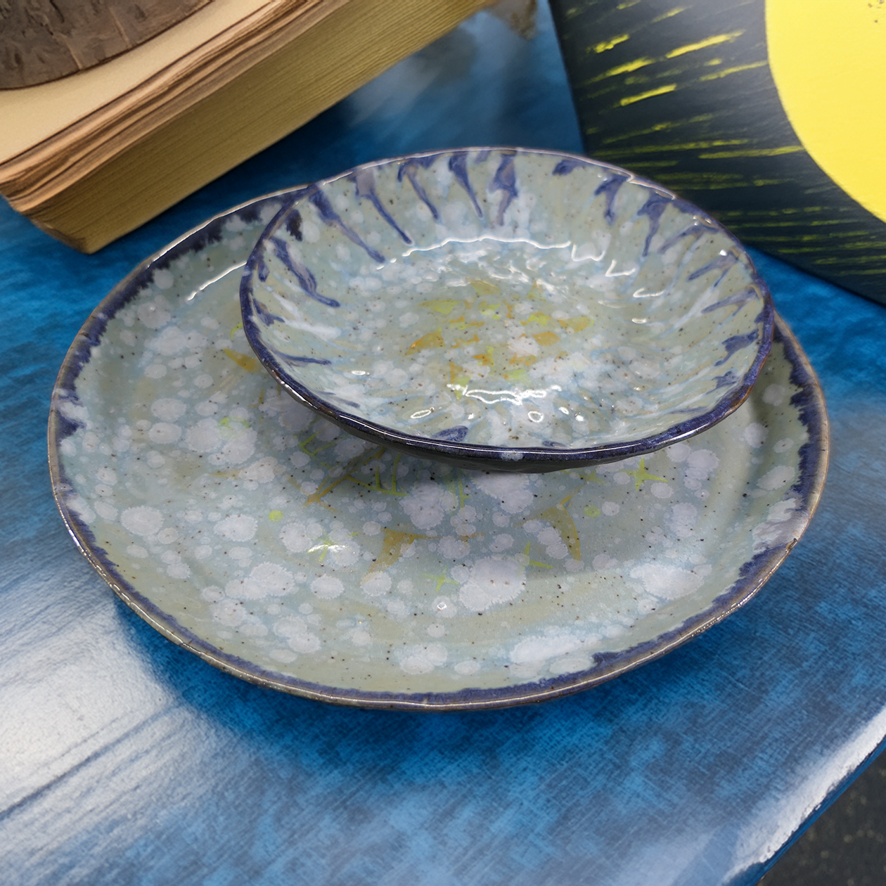 snowy sun plate and bowl on table.png