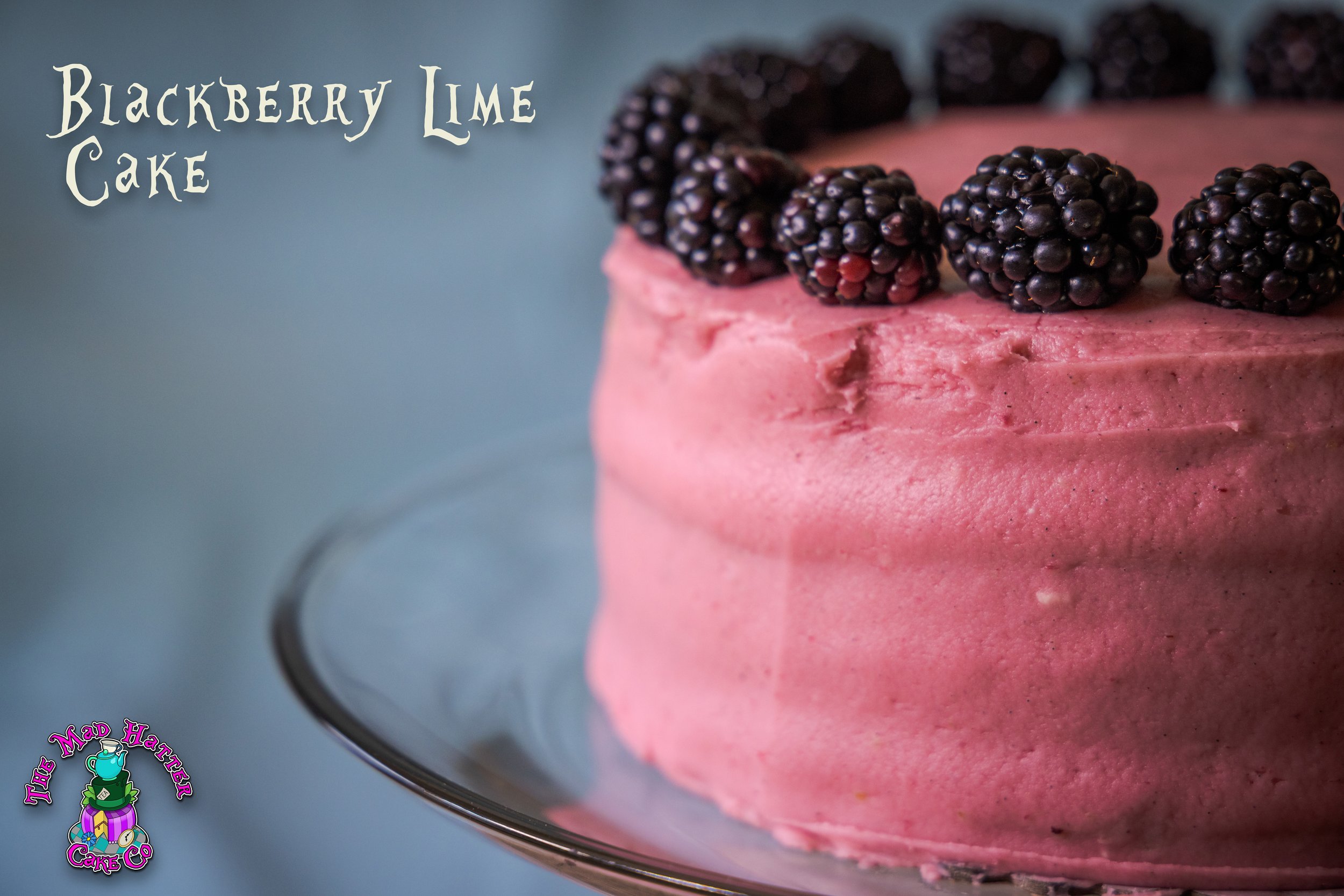 A pink cake with blackberries on top, labeled "Blackberry Lime Cake" with a whimsical logo in the corner.