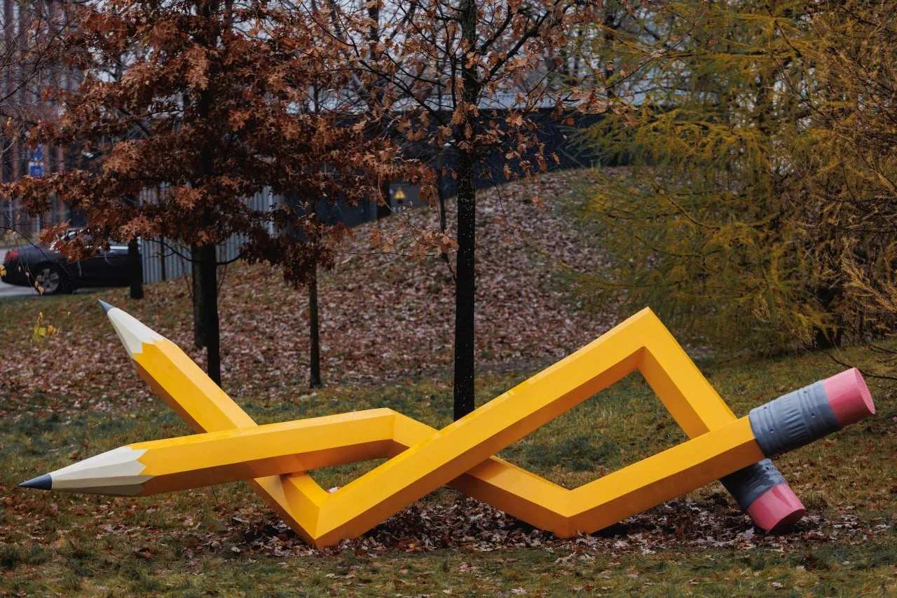 Large sculpture of a yellow pencil by chinese artist Zhou Song in Skolkovo Park , Moscow - Russia 