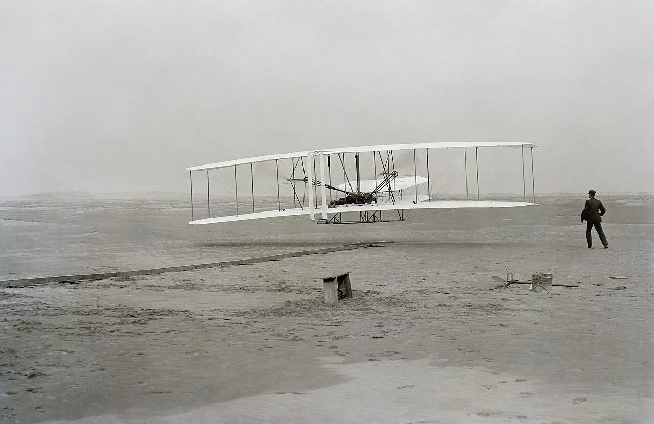 “Wright Brothers’ First Flight” (1903) – John T. Daniels