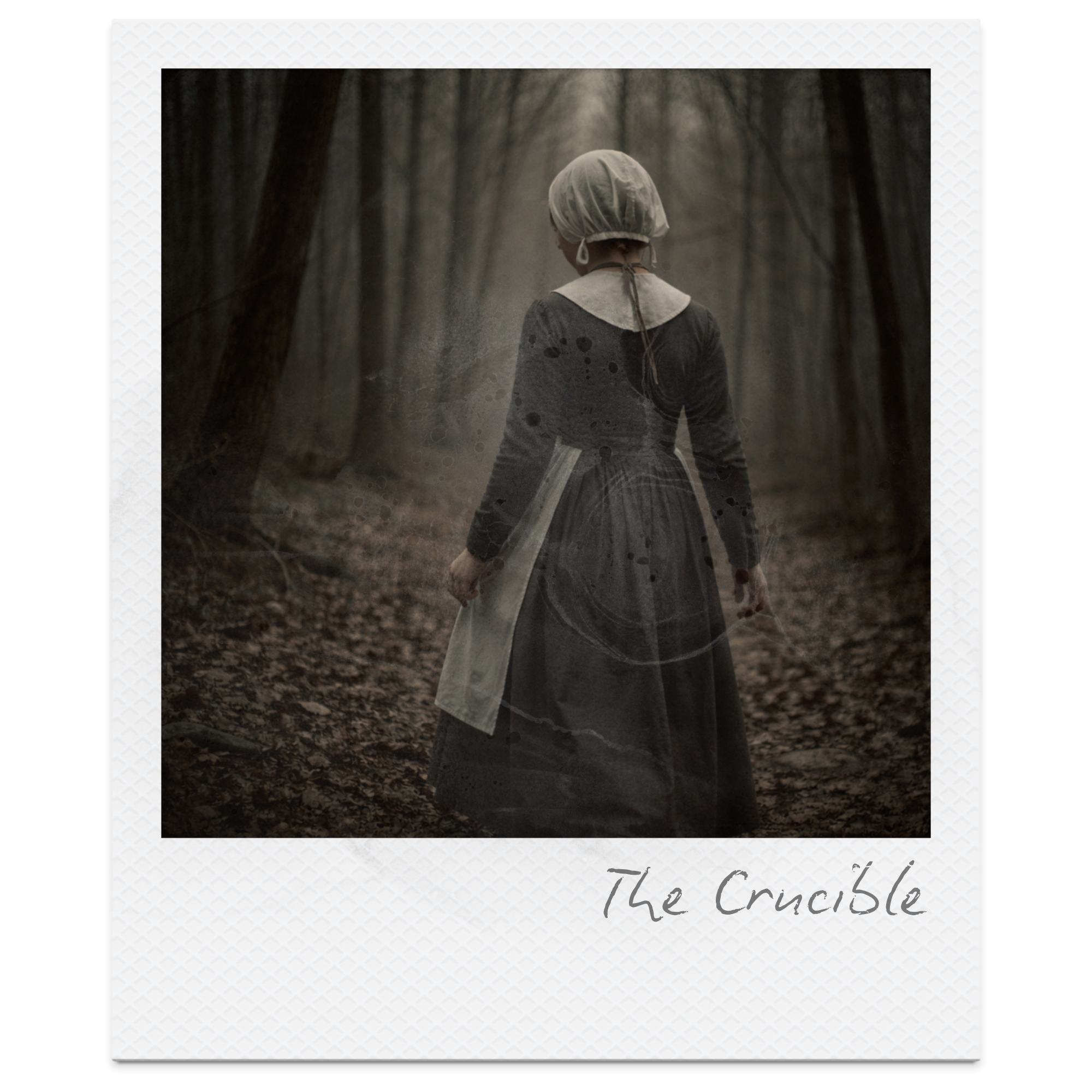 A woman dressed in historical clothing, walking on a path through a dark, foggy forest, with the caption "The Crucible" written at the bottom.