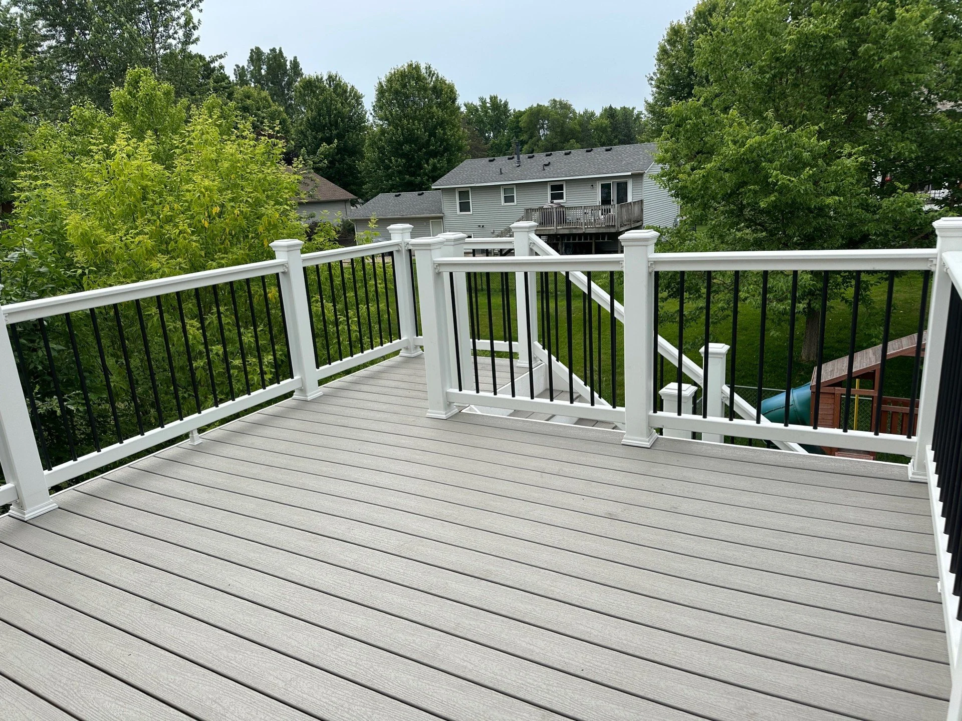 Staircase with a stair lift installed on the left side