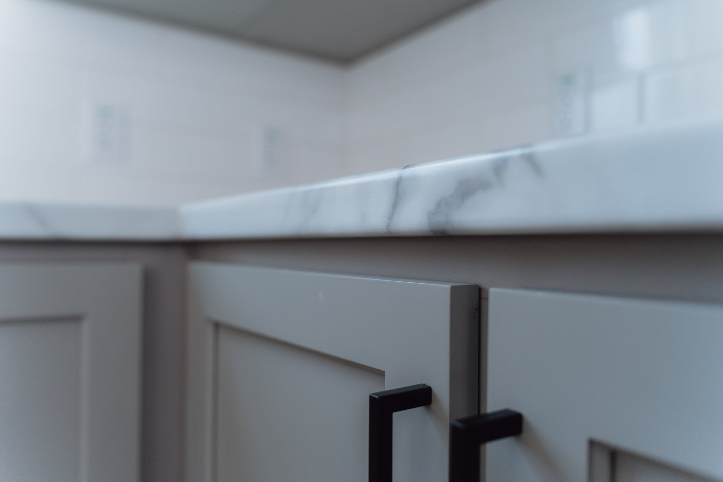 Modern kitchen countertops and cabinetry at Homestead San Antonio in San Antonio, TX