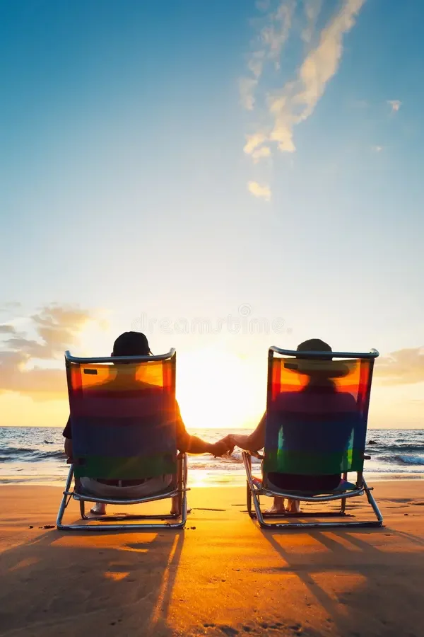 Married couple hand in hand on the beach, representing emotional intimacy and connection through self-paced couples counseling