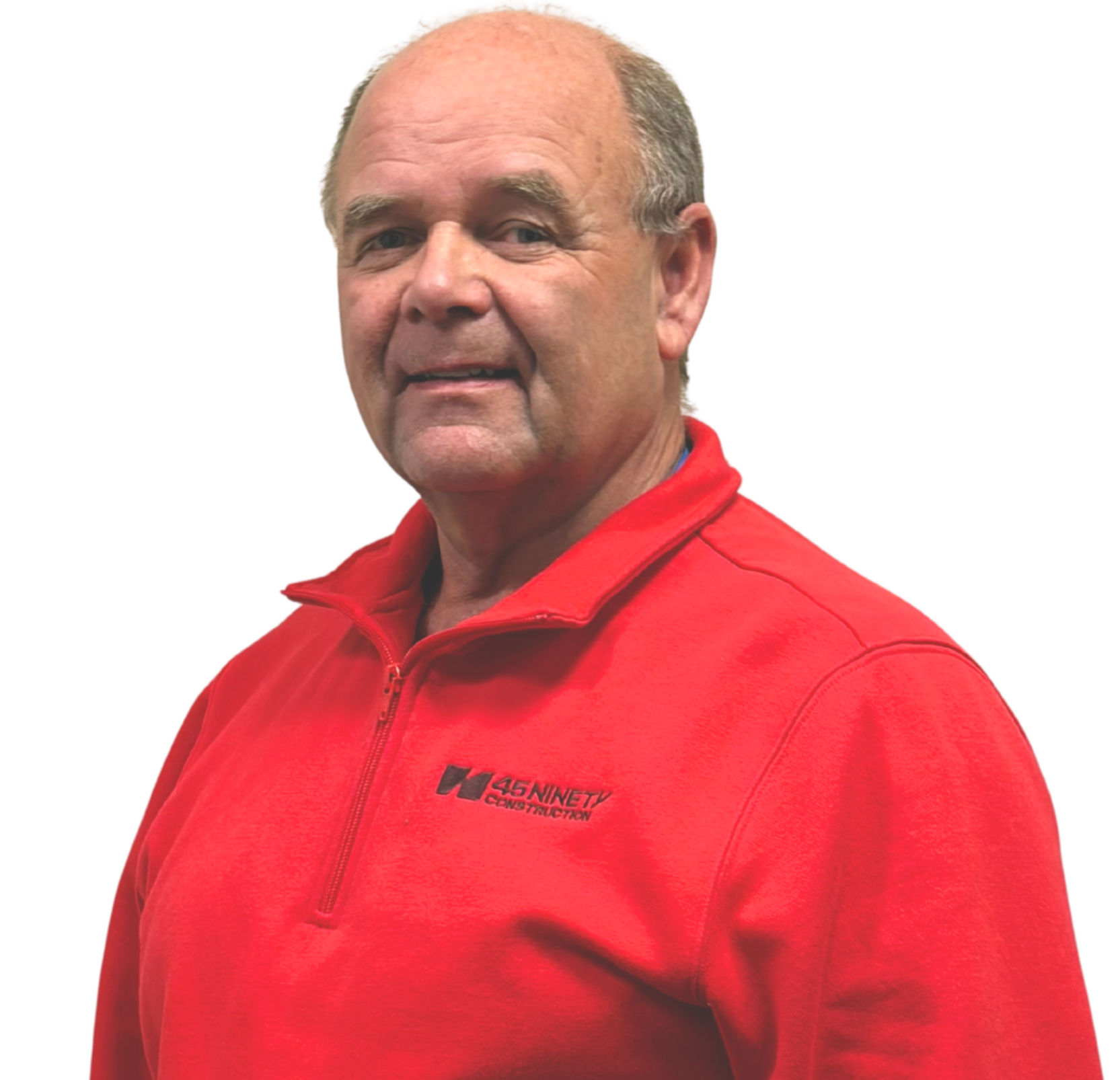 A man wearing a red 45 Ninety Construction jacket with a zipper, looking at the camera.