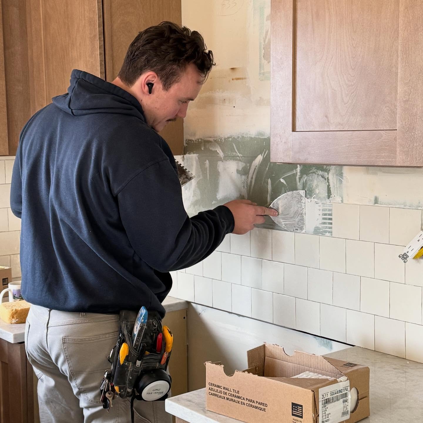 Tile master @ml.tile.installations is in finishing up backsplash for one of our current kitchen Reno&rsquo;s.

This is how you know things are coming to completion soon! Stay tuned for the before &amp; after on this one! 

Ready to flip your outdated