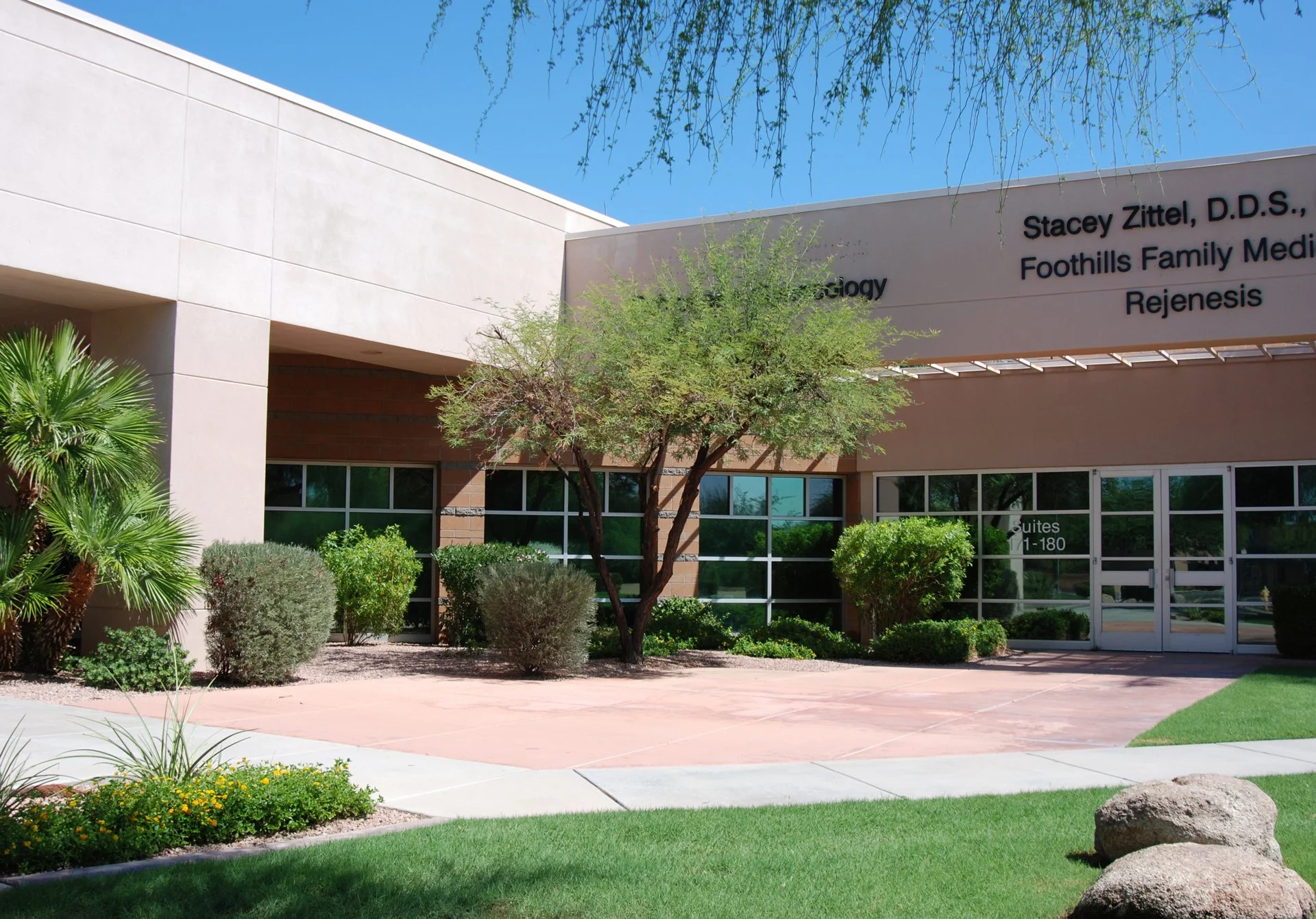 Entrance of a medical building of Foothills medical property, featuring desert landscaping.