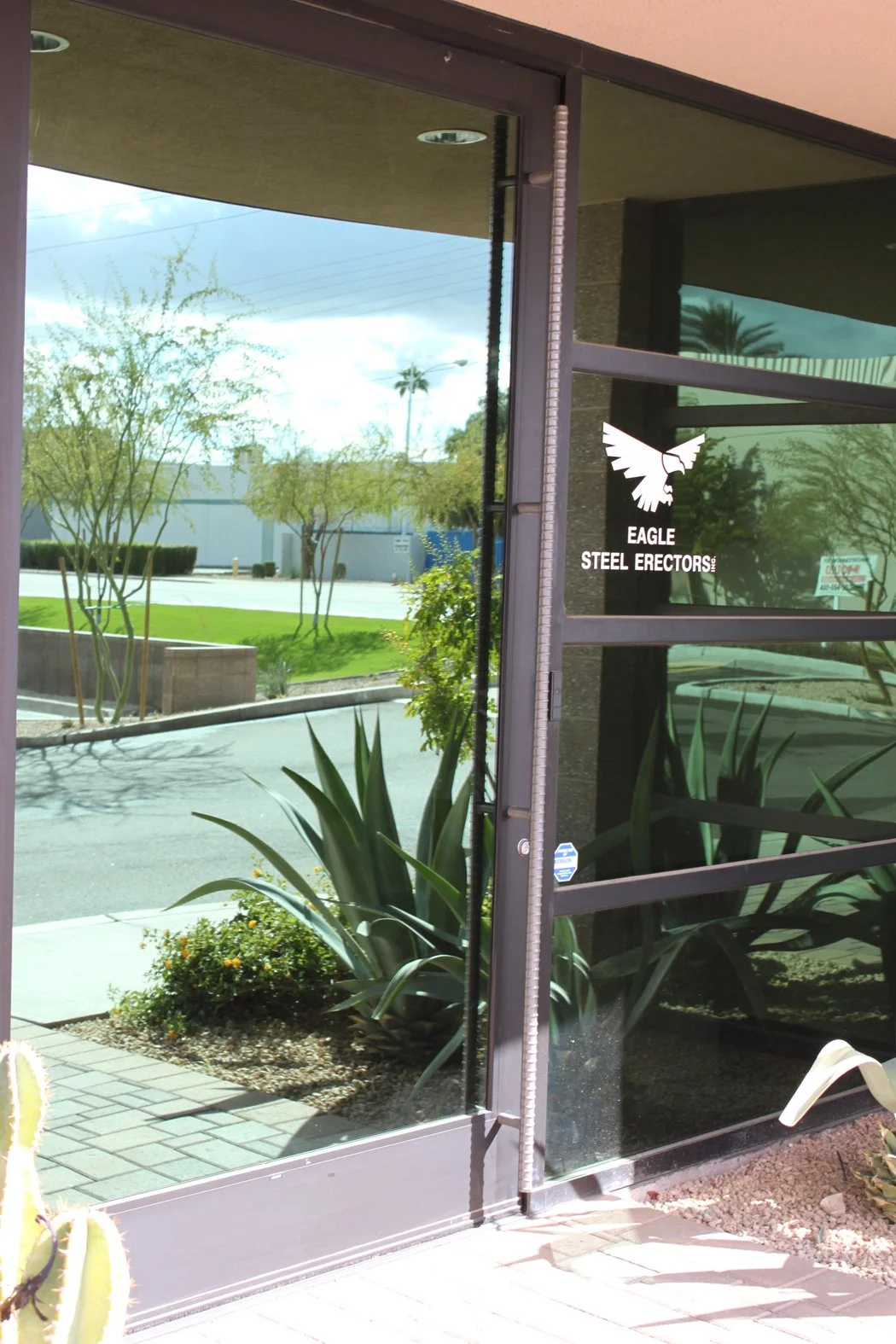 Glass door of Colton Construction office.