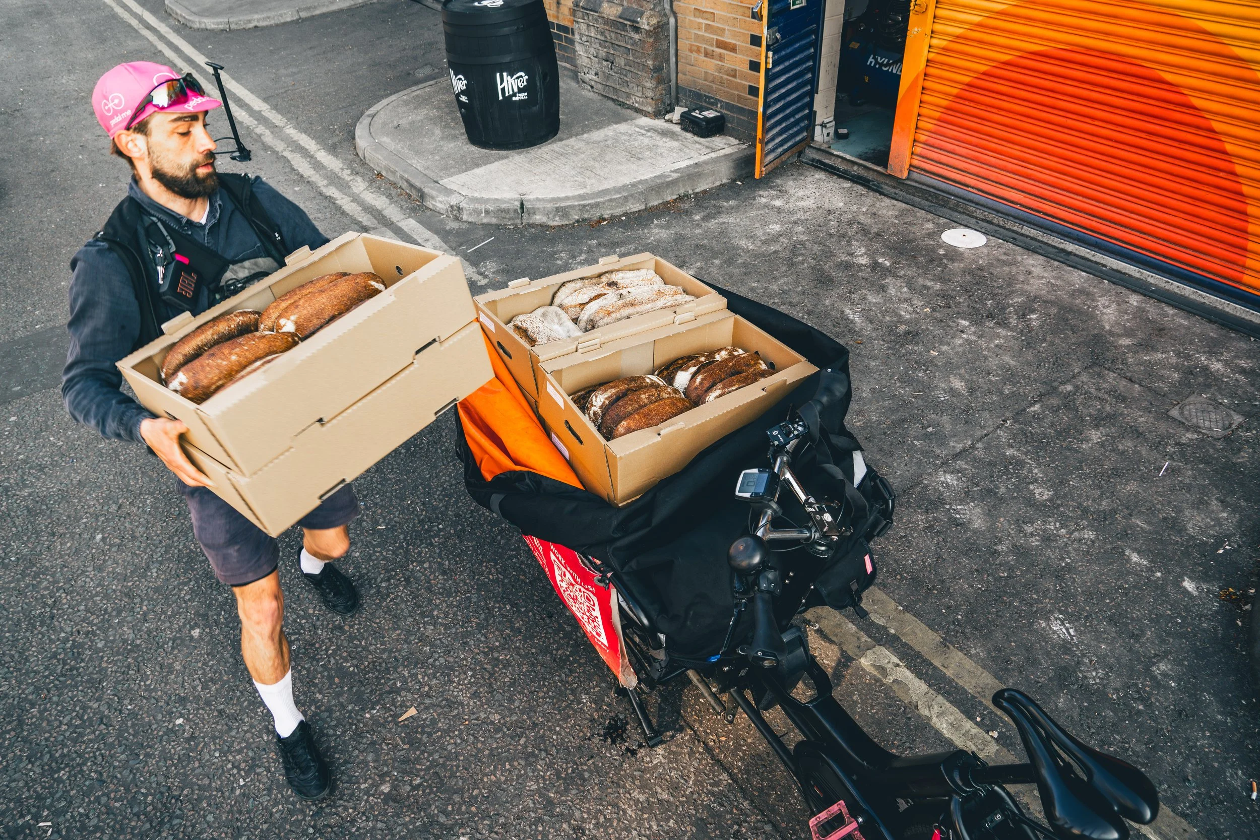 Fresh bakery morning deliveries by cargo bike in London