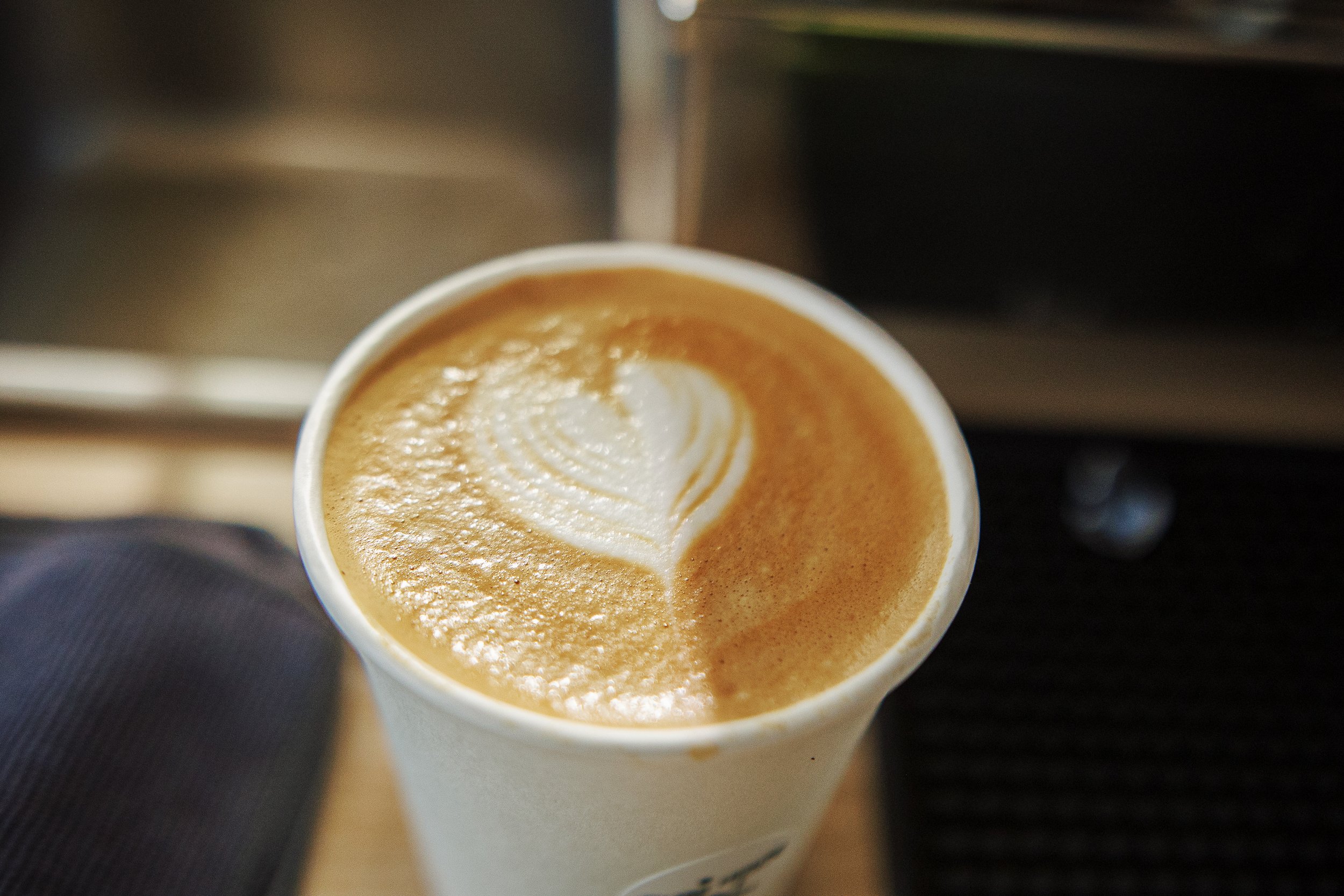 Wedding coffee cart serving lattes and cappuccinos during cocktail hour