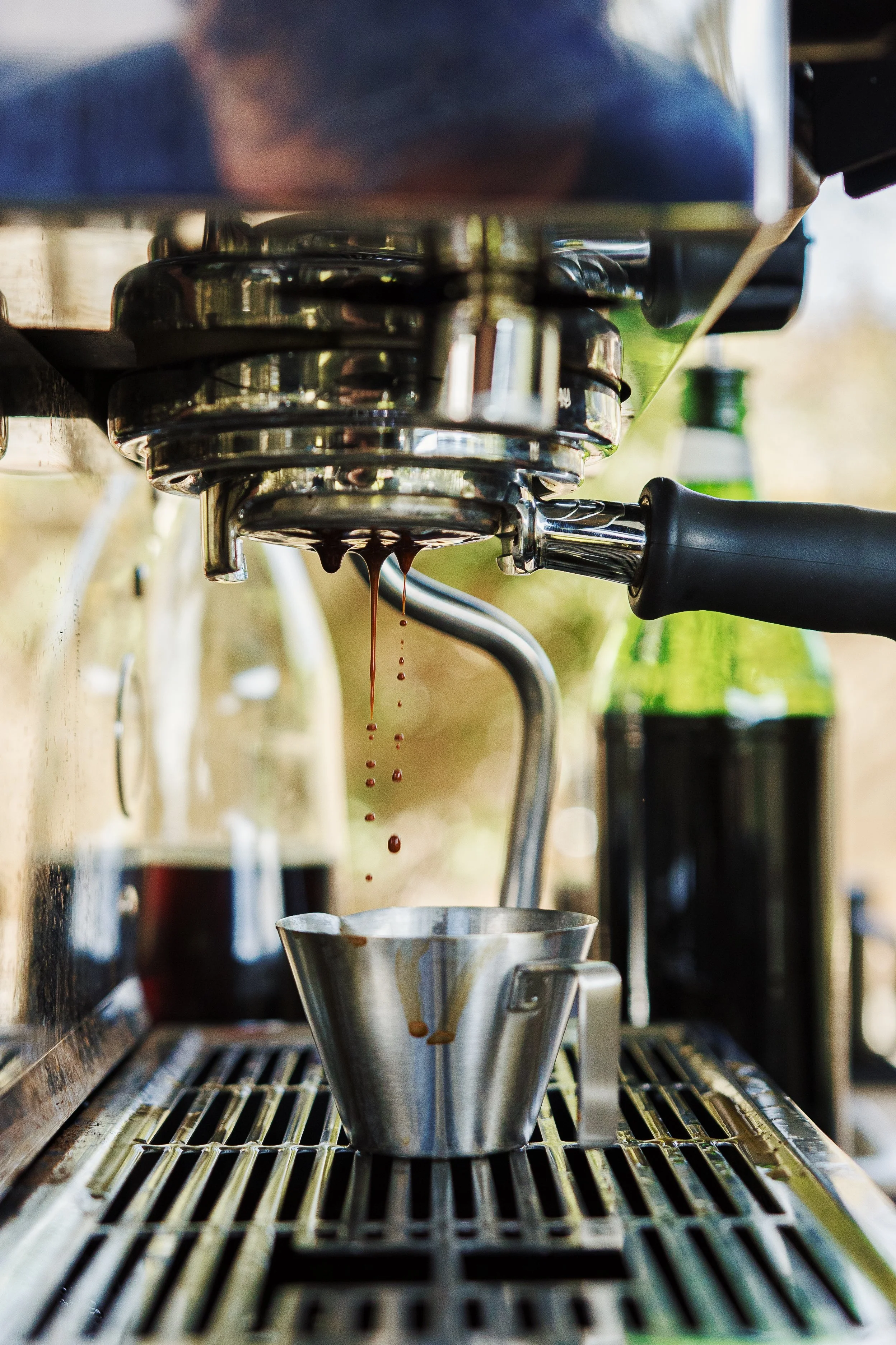 espresso shot being pulled for hot latte 
