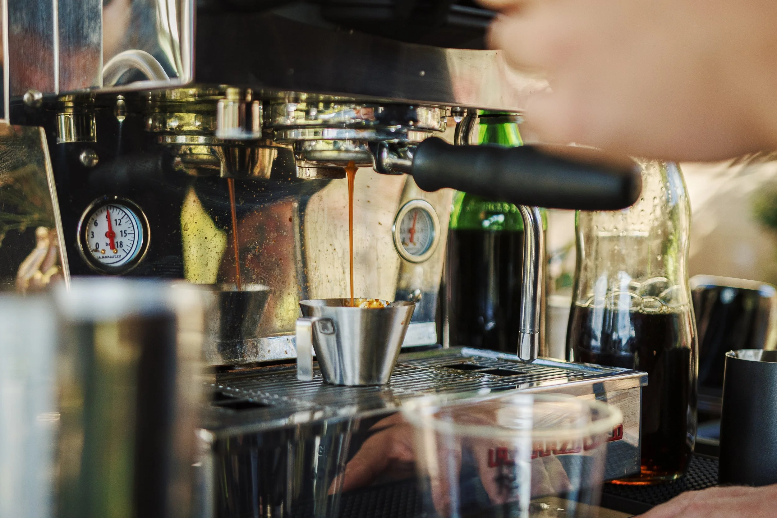 espresso shot being pulled during wedding