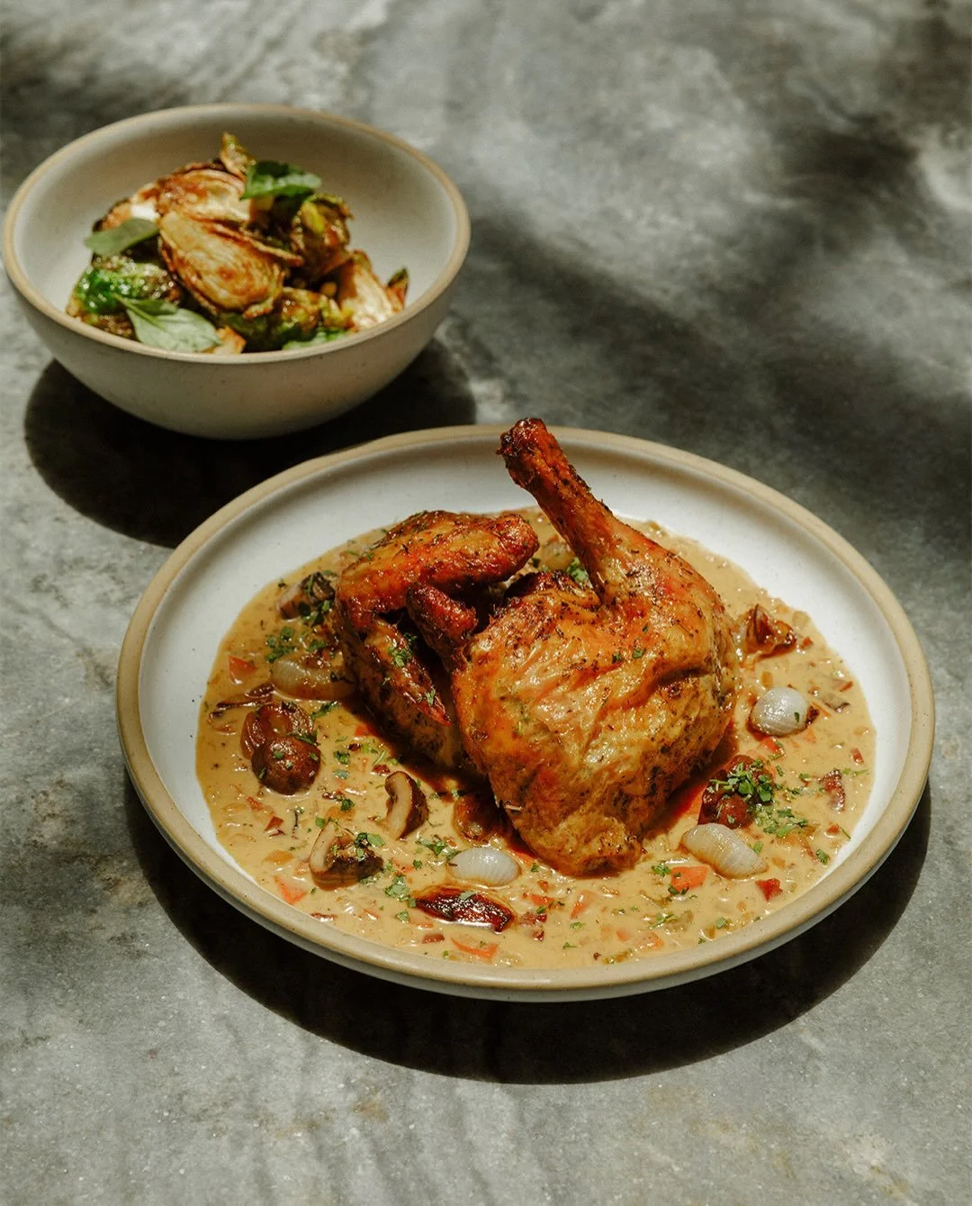 half roasted chicken. now in coq au vin blanc sauce.
#zinque #massilia #chicken #bestfoodla #laeats