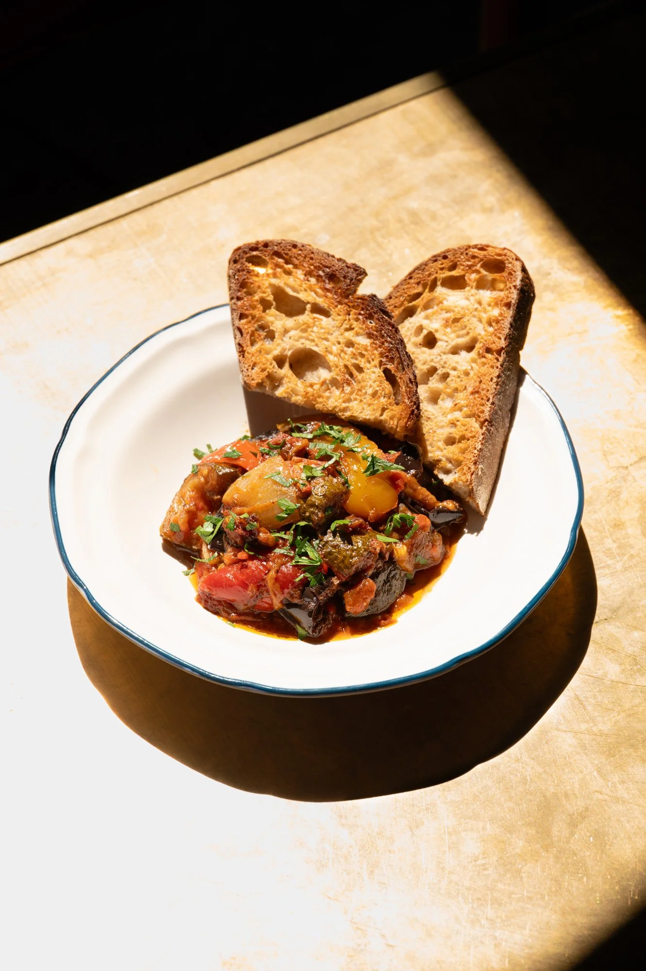 Photo of ratatouille roasted vegetables at zinqué, a French restaurant