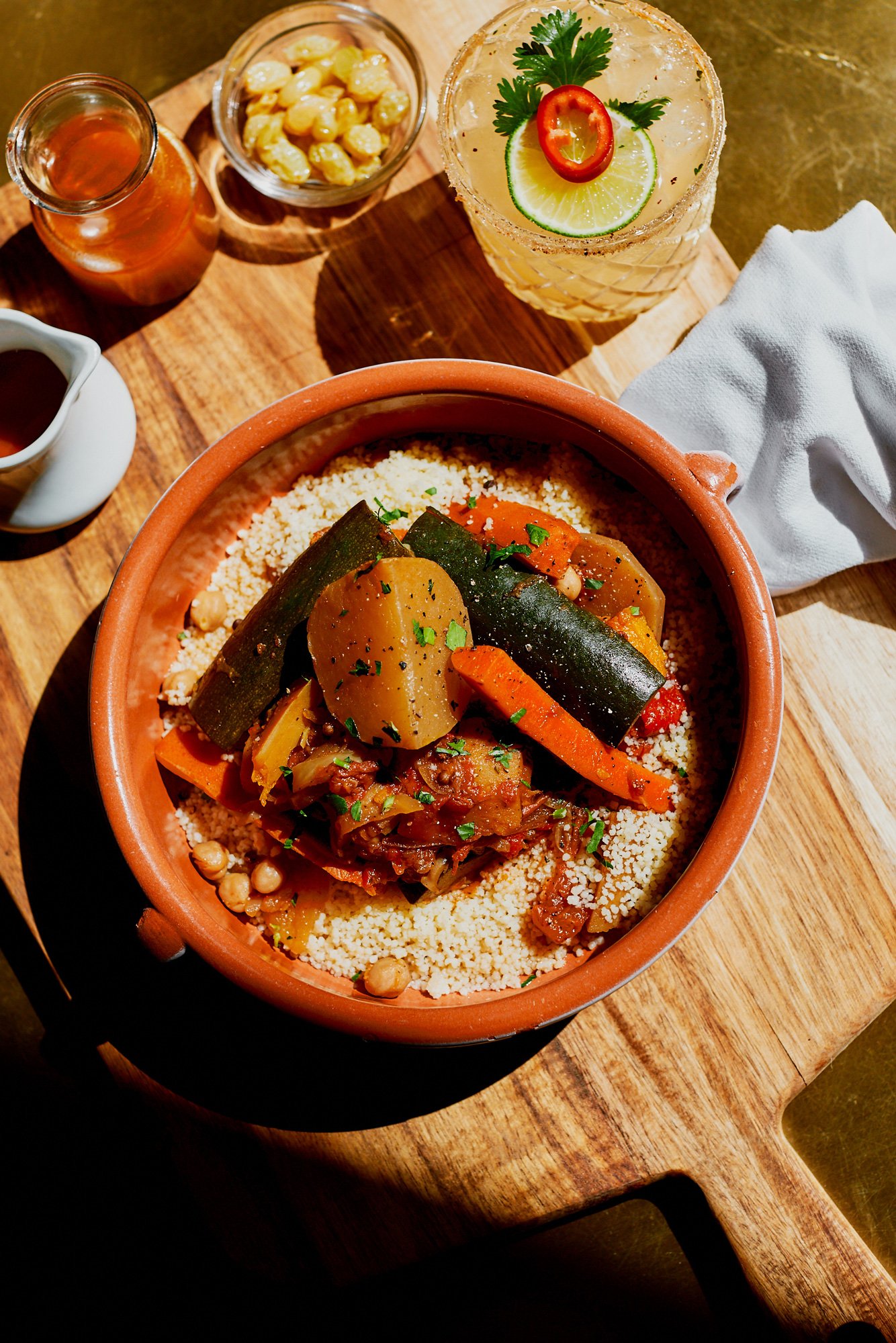 Photo of seven vegetables couscous tajine with spicy margarita at zinqué, a French restaurant