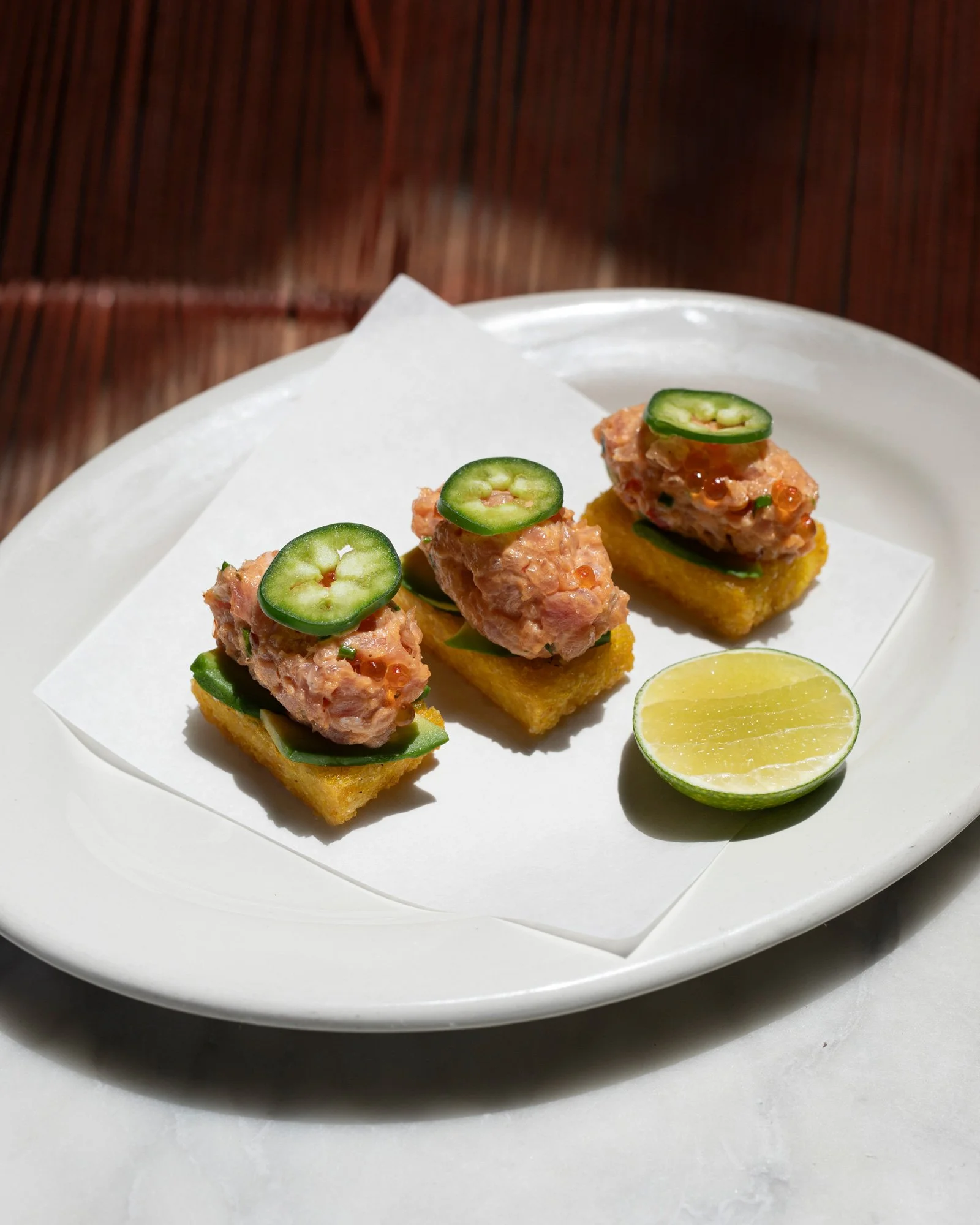 Photo of ahi tuna crispy saffron rice bites at zinqué, a French restaurant