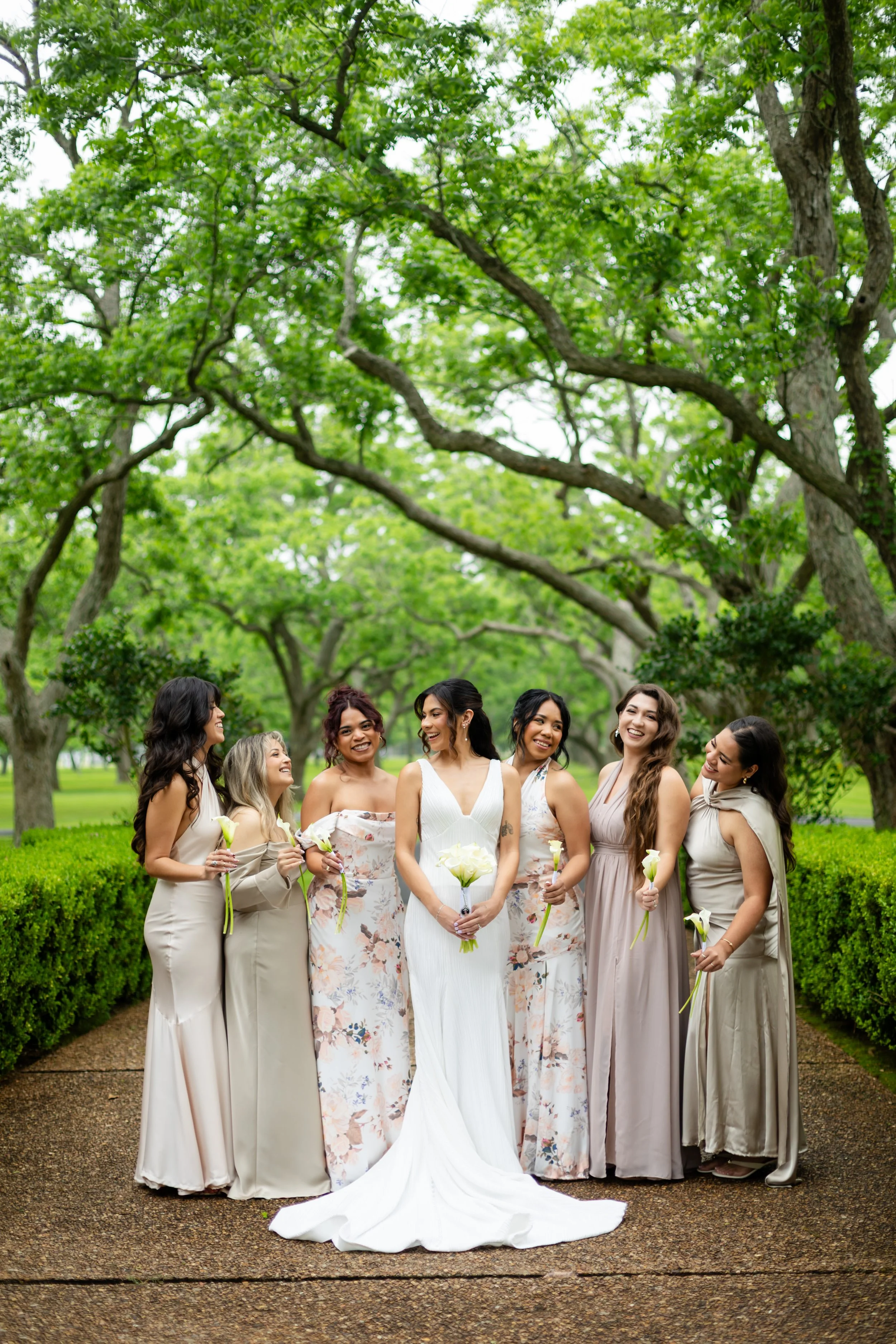 a girl is standing by her girls while outside 