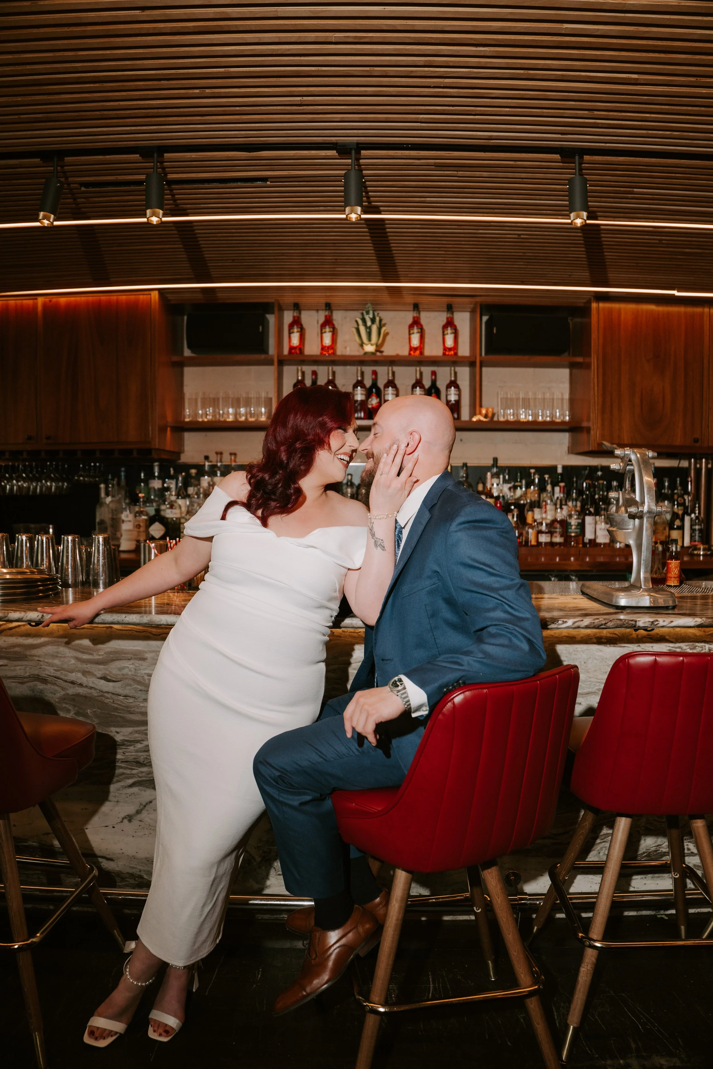 engagement session of bride and groom at a restaurant in houston tx