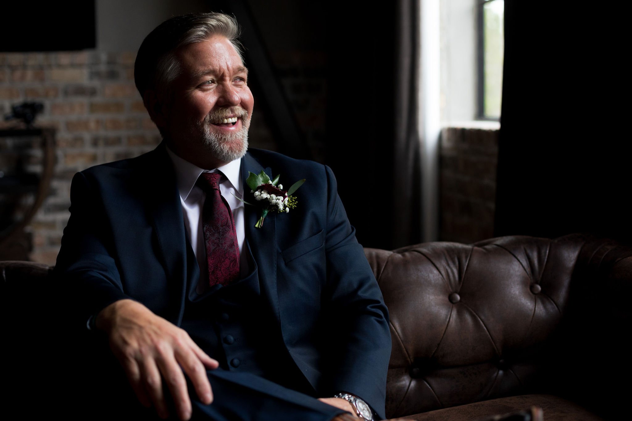 A cinematic wedding scene highlighting candid emotion, modern styling, and authentic connection between couples.