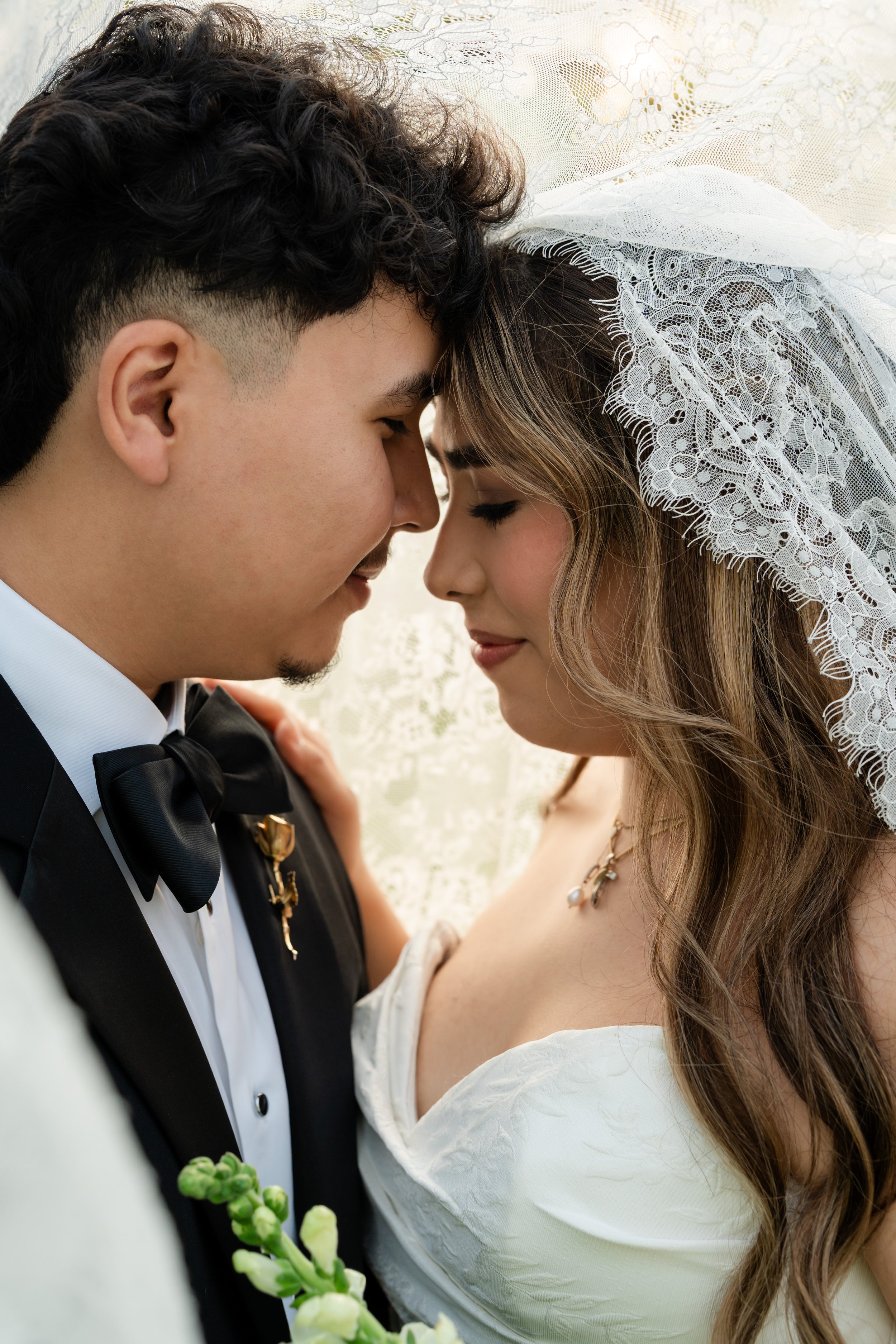 a couple is looking into each other 