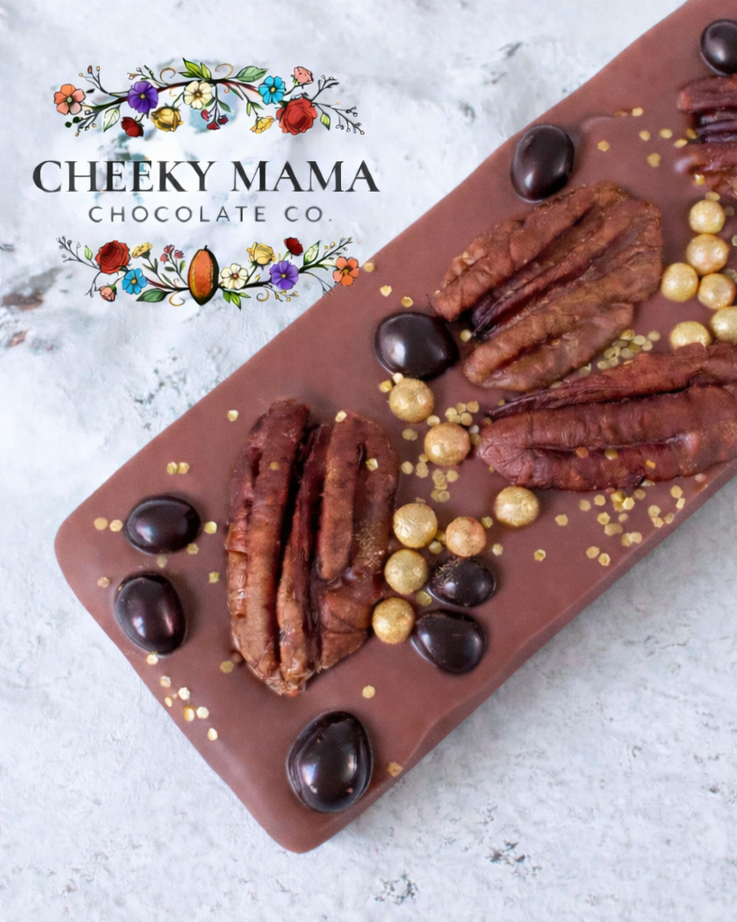 Belgian ruby chocolate with pecans, cacao nibs, gold dragées and gold shimmer